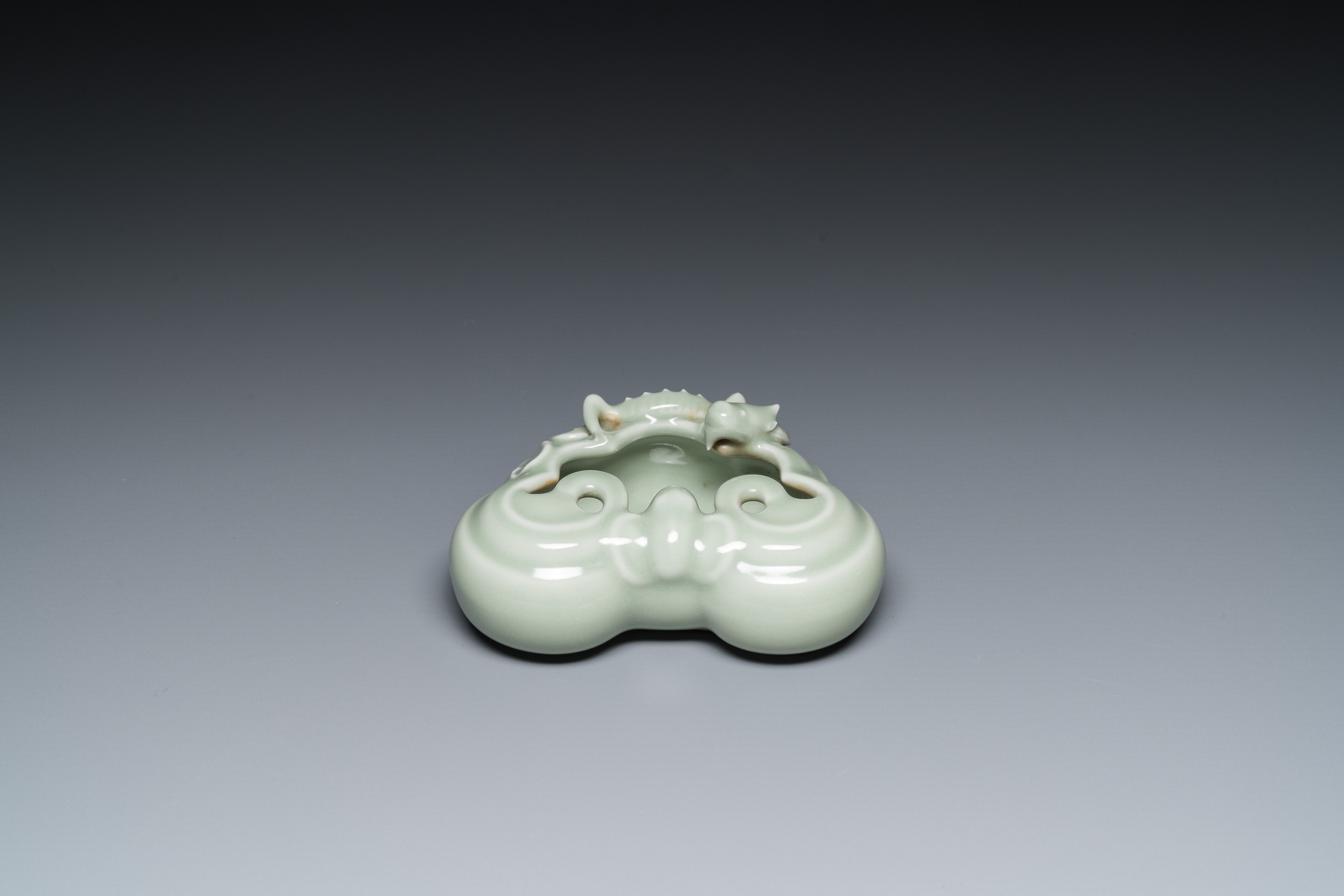 A Chinese celadon-glazed 'lingzhi' brush washer, Qianlong mark, 19/20th C. - Image 2 of 15