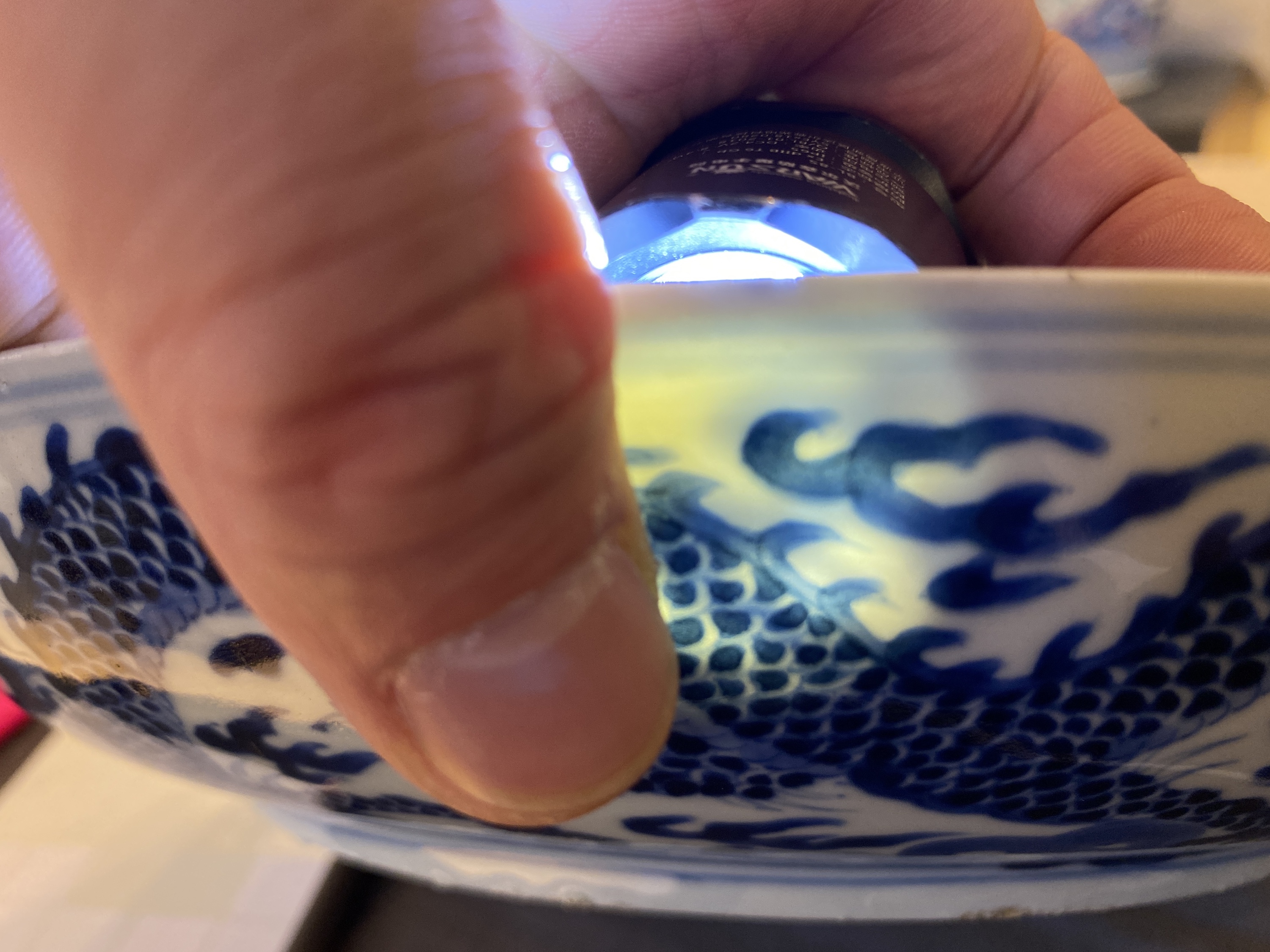 A Chinese blue and white 'dragon' dish, Kangxi mark and of the period - Image 17 of 18