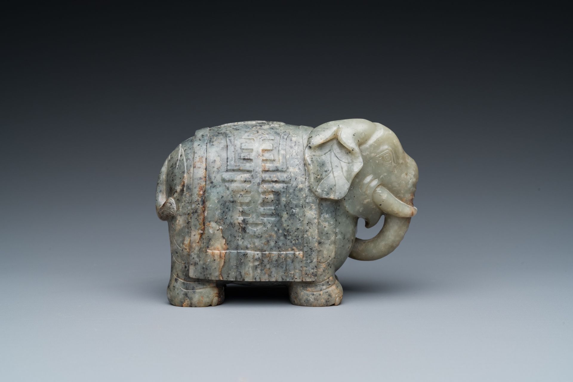 A Chinese grey-speckled celadon jade elephant, Qing - Image 4 of 18
