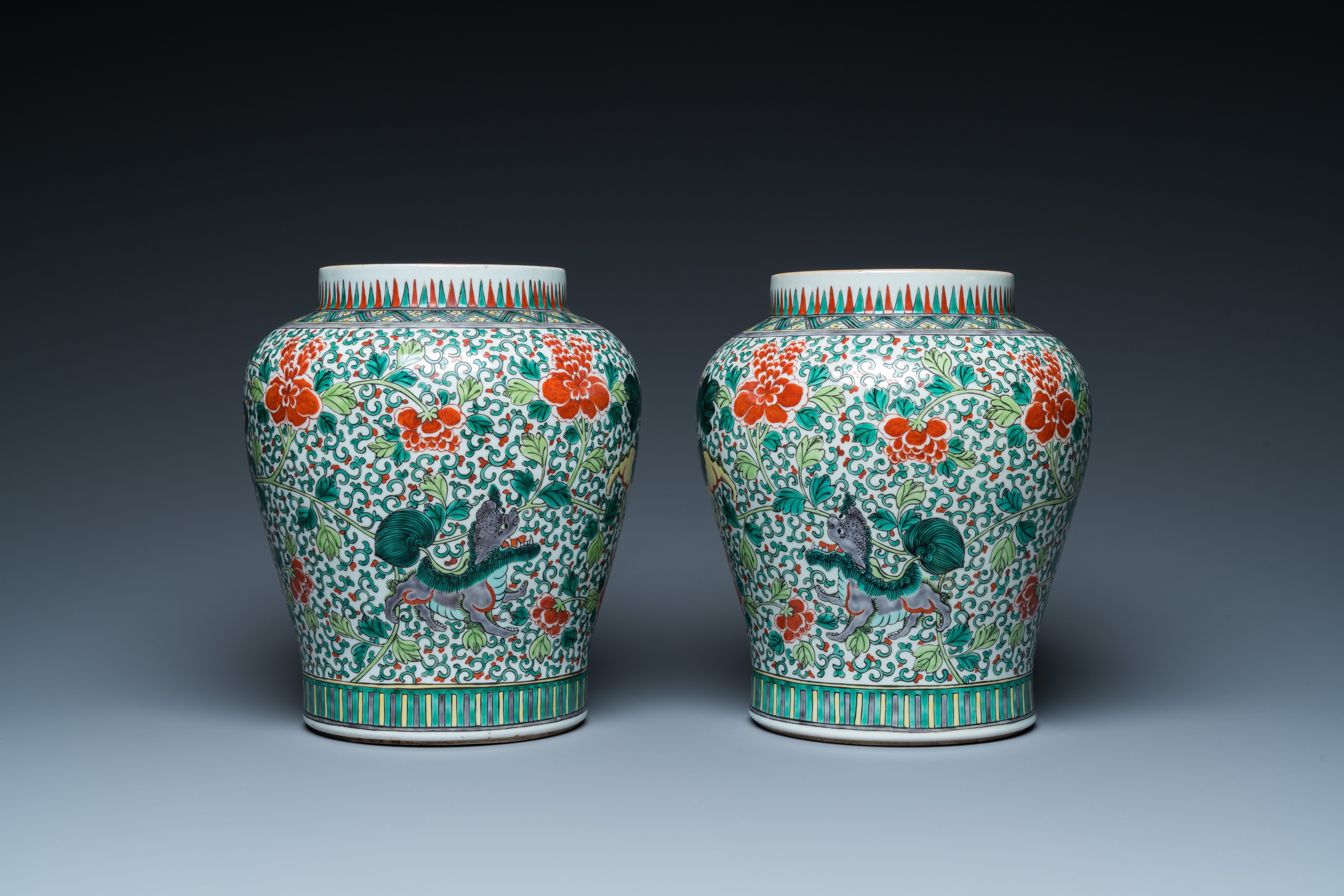 A pair of Chinese famille verte 'Buddhist lions' vases, 19th C. - Image 3 of 16