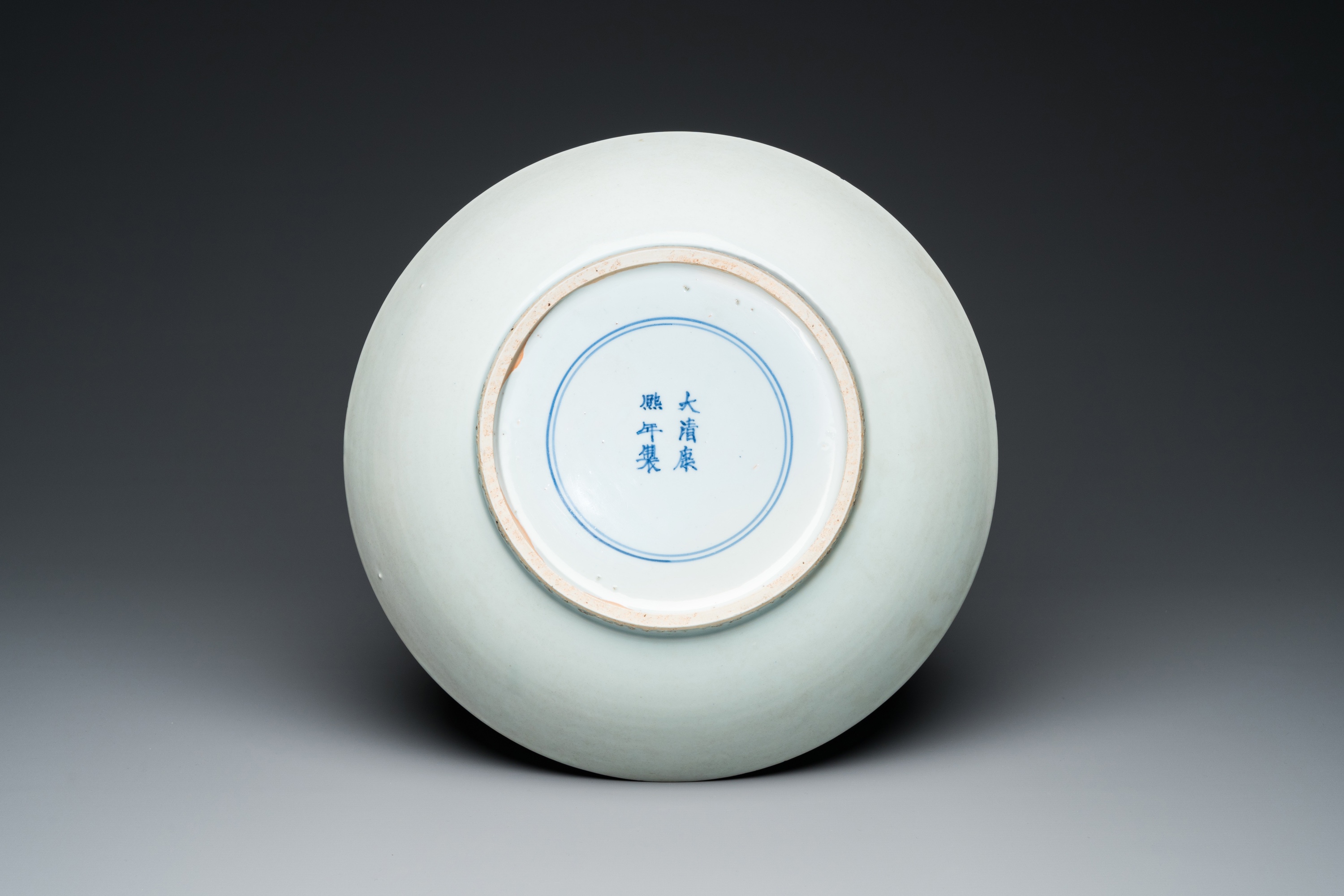 A large Chinese blue and white 'lady and boy' dish, Kangxi mark and of the period - Image 2 of 13