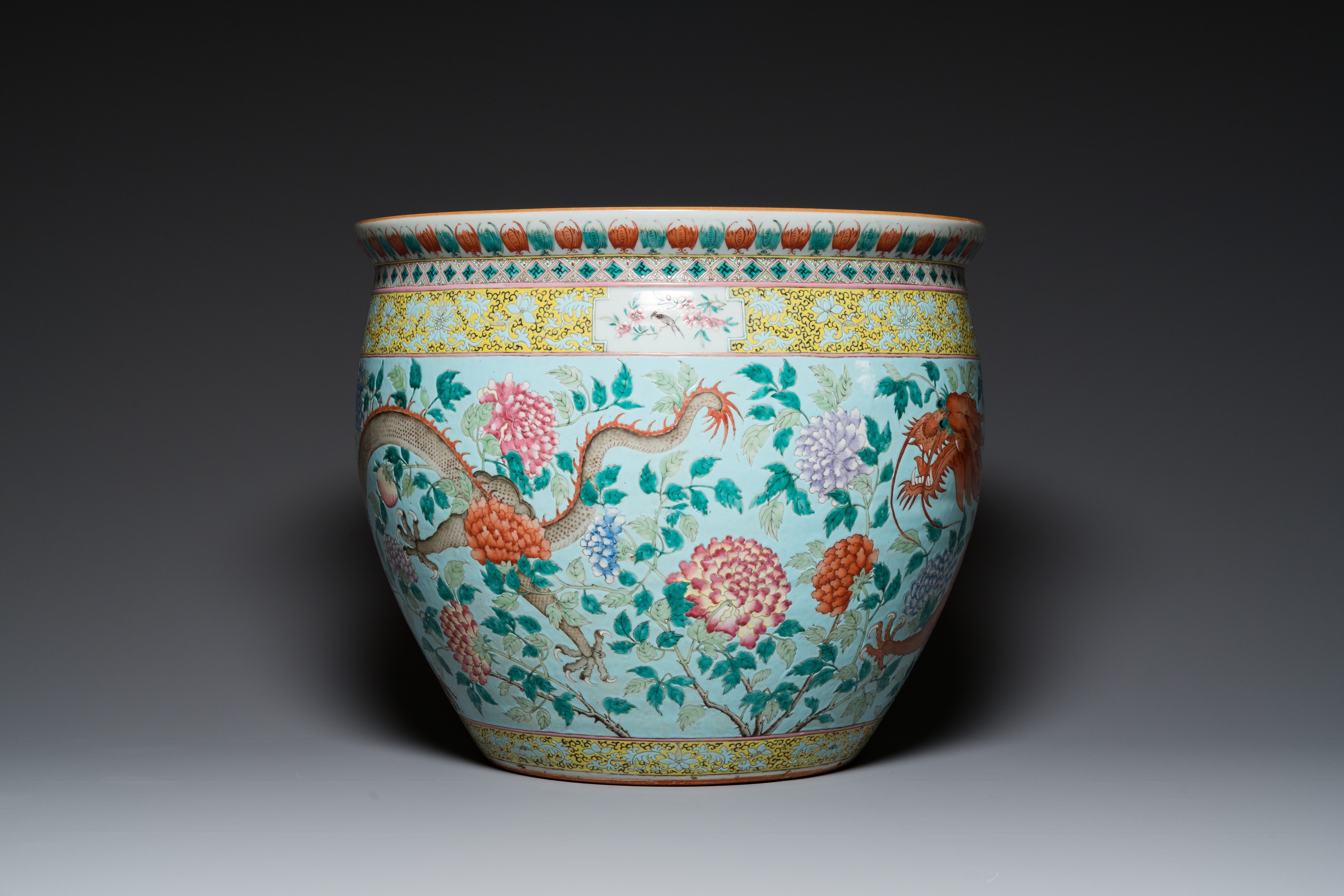 A large Chinese famille verte light blue-ground fish bowl, 19th C. - Image 3 of 28