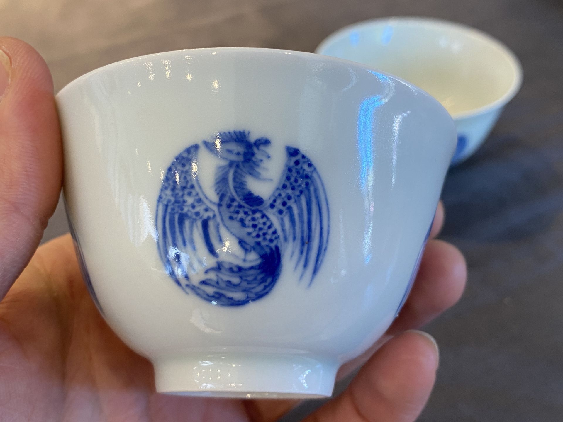 A pair of Chinese blue and white cups, Daoguang mark, 19/20th C. - Image 13 of 17