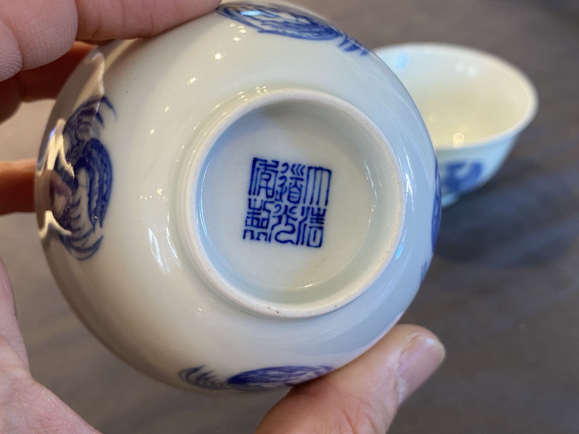 A pair of Chinese blue and white cups, Daoguang mark, 19/20th C. - Image 14 of 17