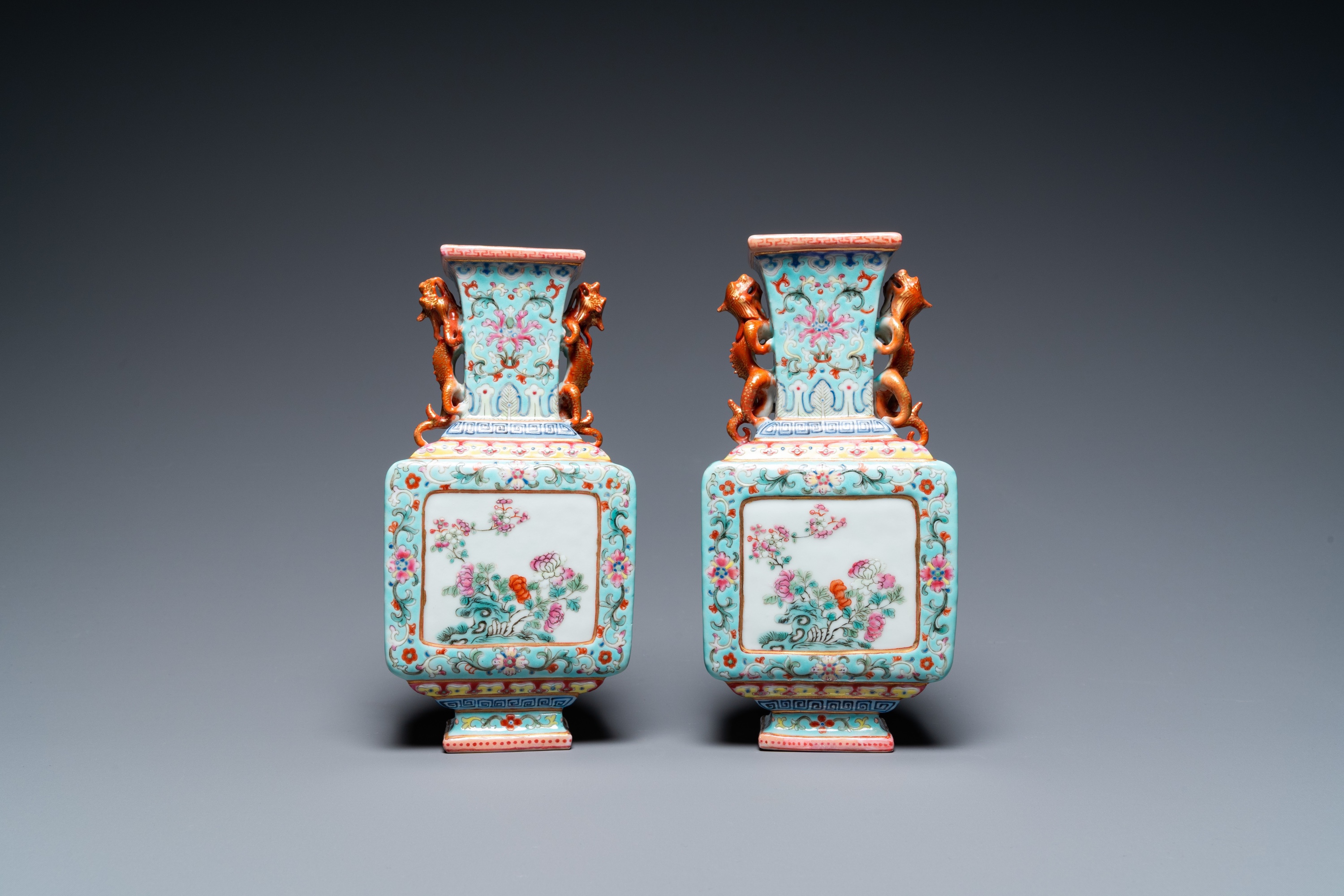 A pair of Chinese famille rose turquoise-ground vases, Qianlong mark, 19/20th C. - Image 3 of 6