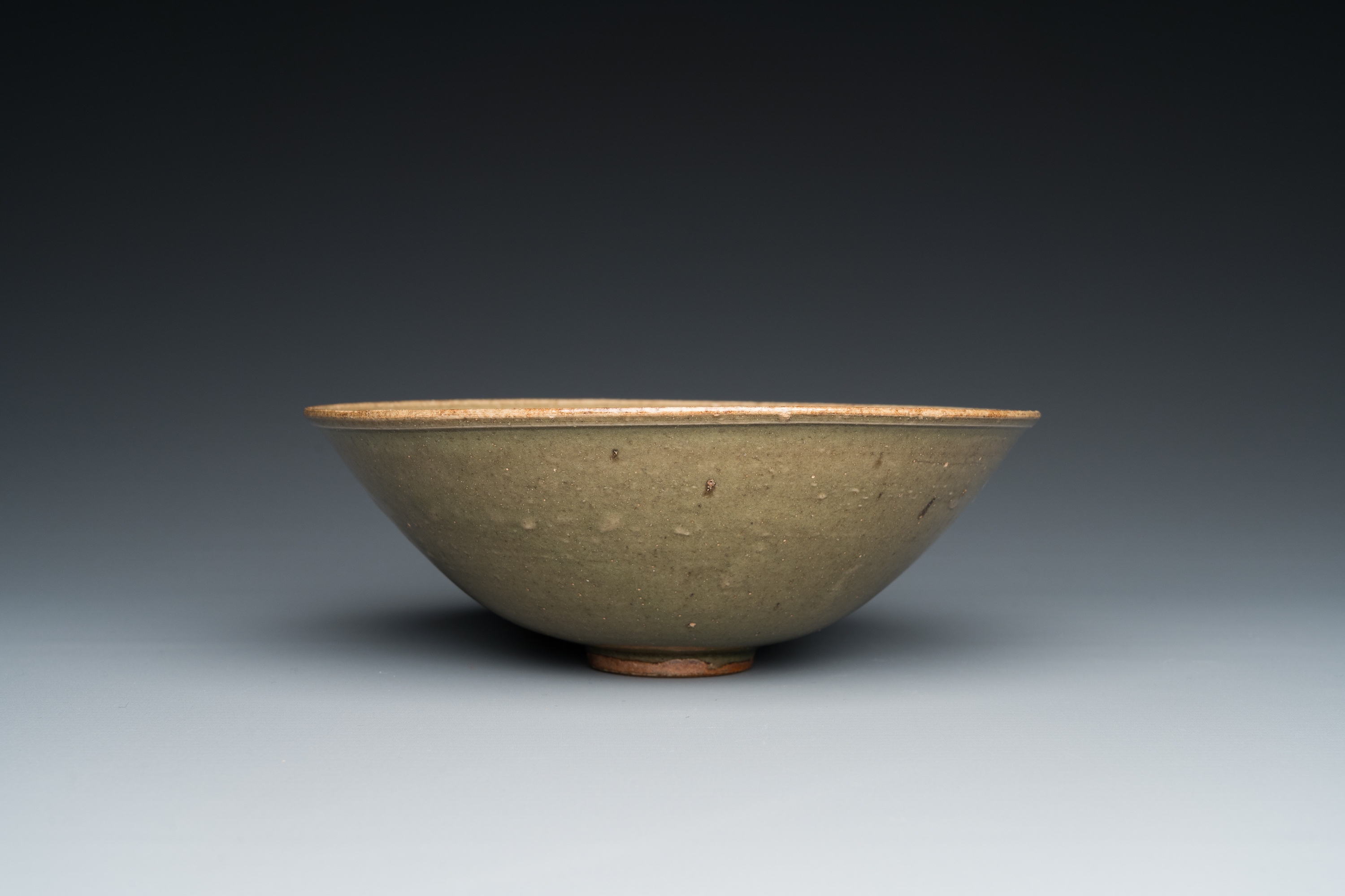 A Chinese Yaozhou celadon bowl with underglaze floral design, probably Ming - Image 6 of 7
