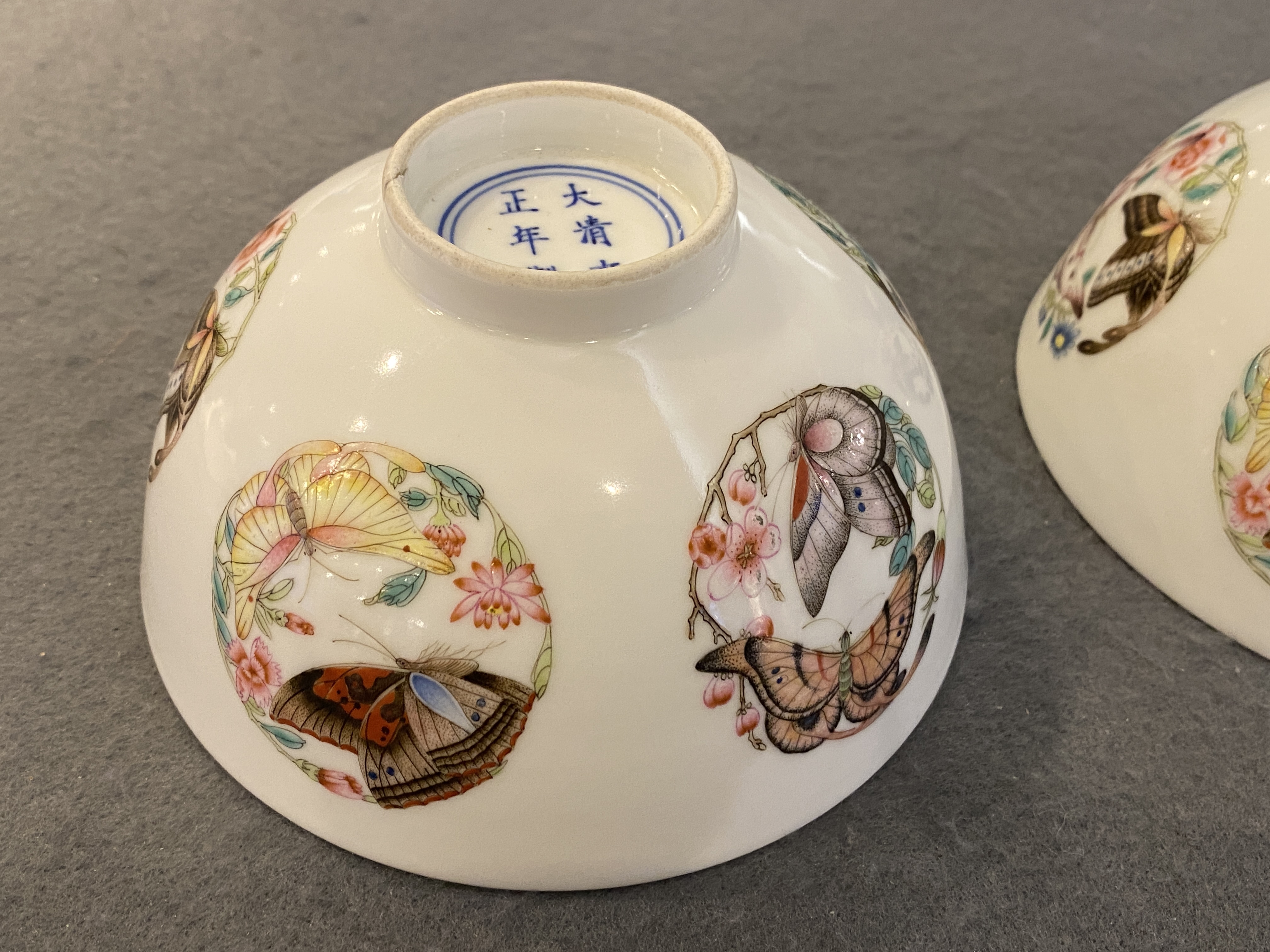 A pair of Chinese famille rose 'butterfly' bowls, Yonzheng mark, probably Republic - Image 10 of 16