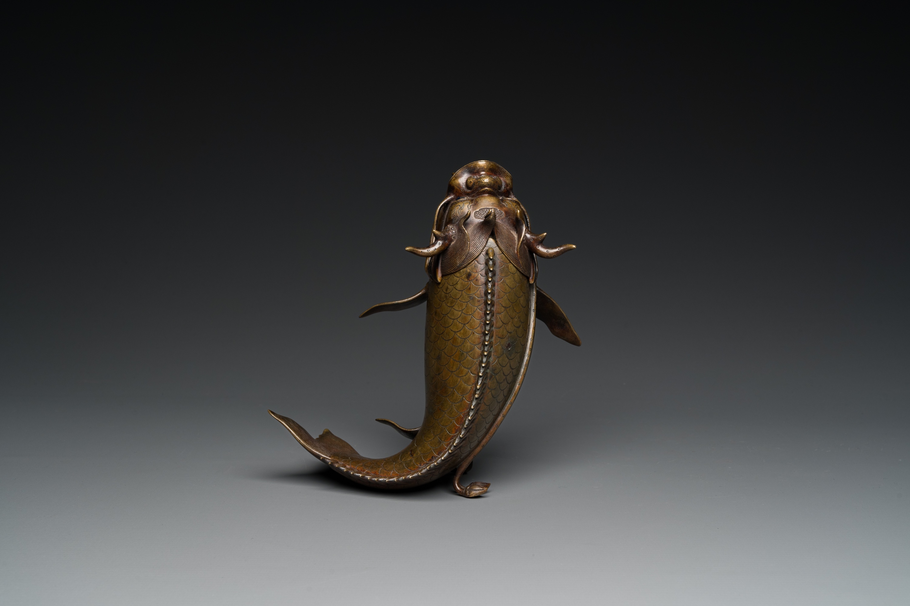 A Chinese bronze dragonfish form censer, Ming - Image 12 of 29