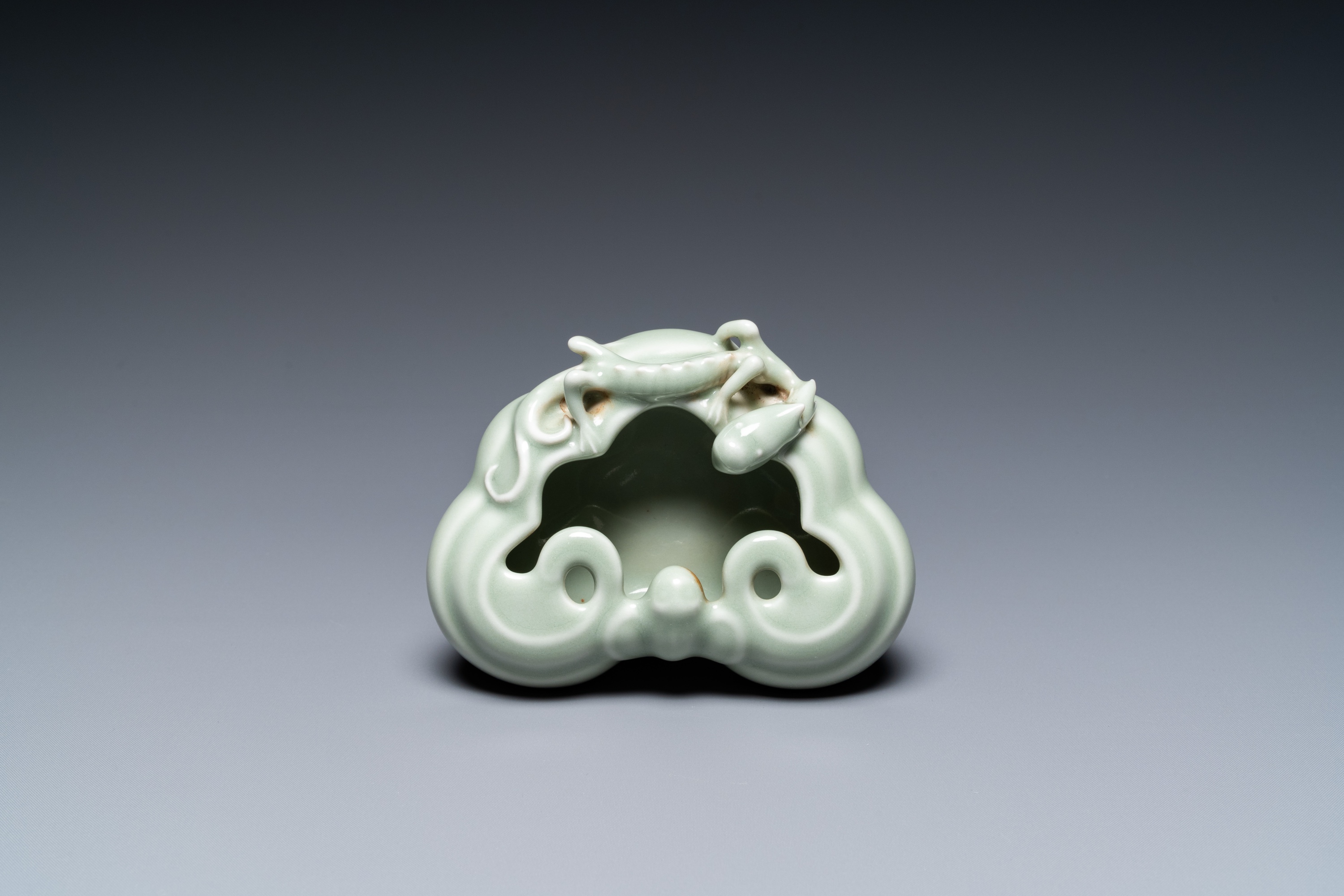 A Chinese celadon-glazed 'lingzhi' brush washer, Qianlong mark, 19/20th C. - Image 3 of 15