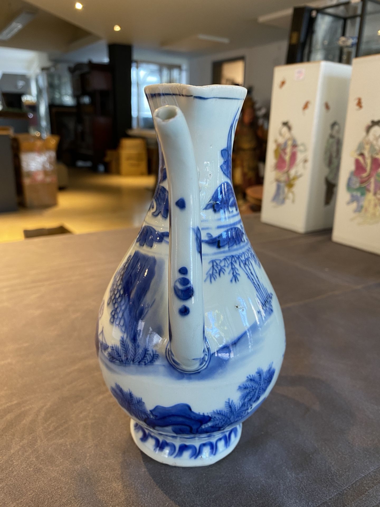 A Chinese blue and white ewer with figures in a landscape, Transitional period - Image 10 of 24