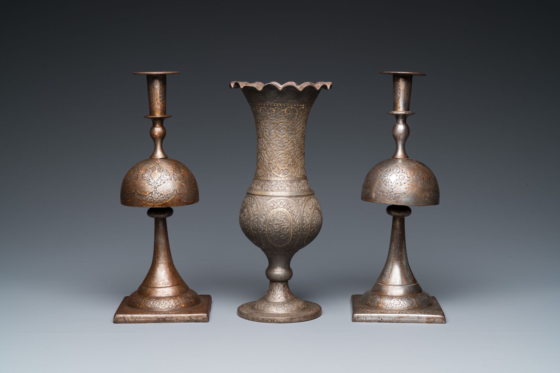 A pair of Qajar damascened candlesticks and a vase, Persia, 19th C. - Image 4 of 7