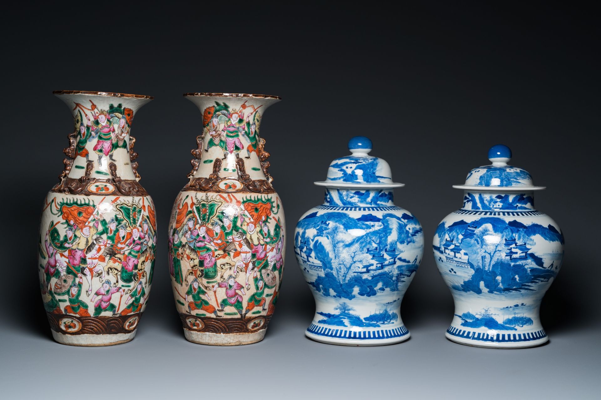 A pair of Chinese blue and white covered vases and a pair of Nanking famille rose vases, 19th C. - Image 2 of 9