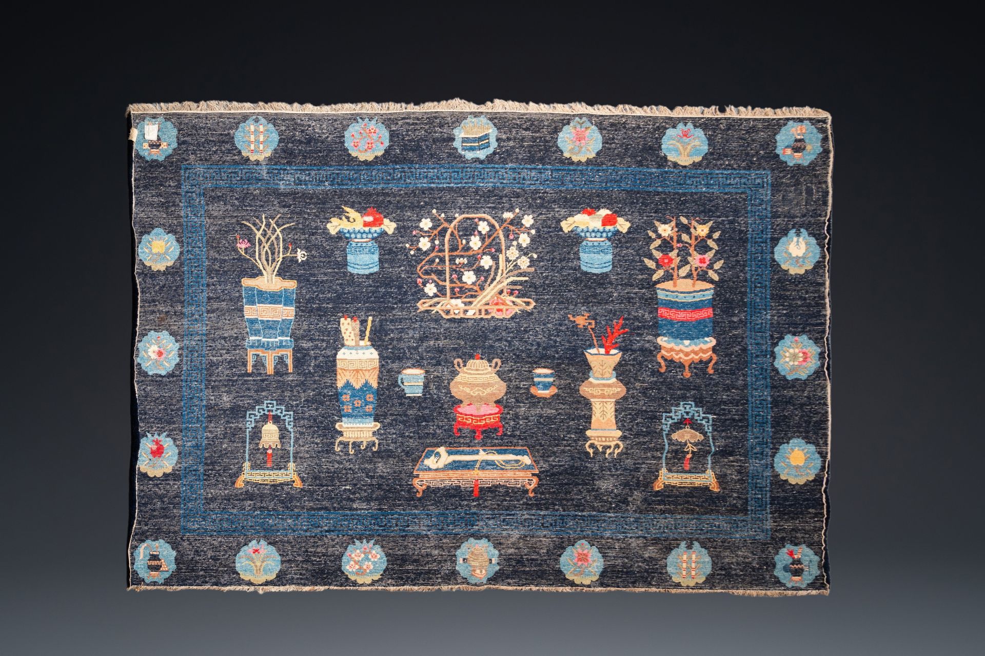 A large Chinese blue-ground 'antiquities' rug, 19th C. - Image 6 of 6