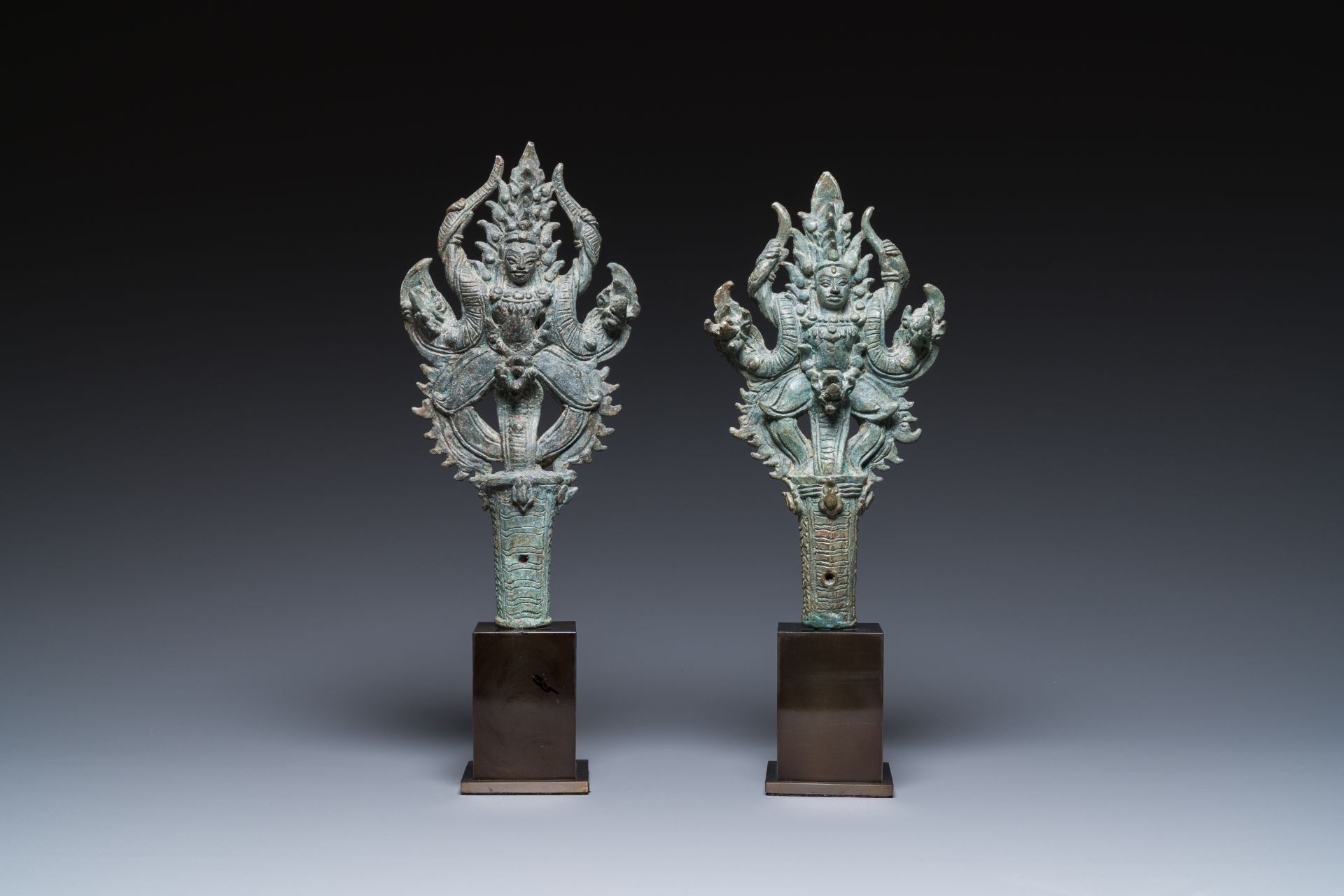 A pair of Khmer bronze ornaments showing dancing Apsaras in Bayon-style, Cambodia, Angkor period, 13