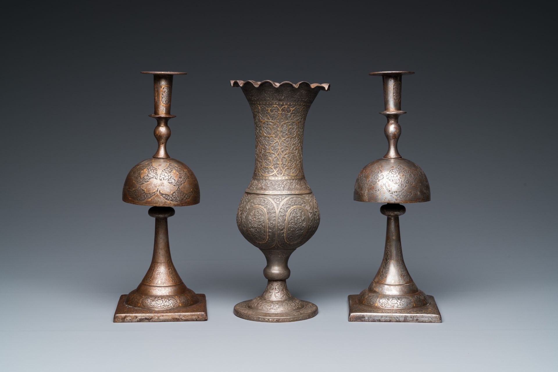 A pair of Qajar damascened candlesticks and a vase, Persia, 19th C. - Image 5 of 7