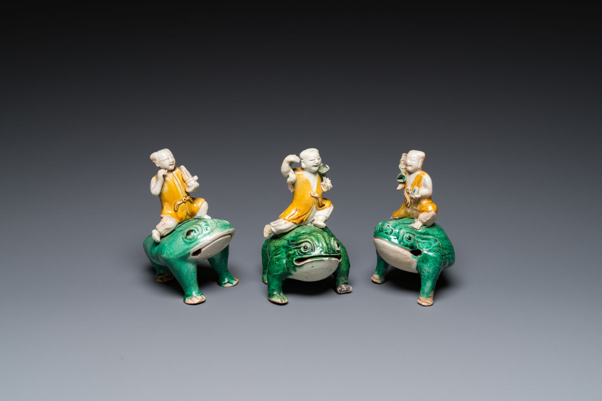 Three Chinese verte biscuit sculptures of Liu Hai on the three-legged toad, Kangxi