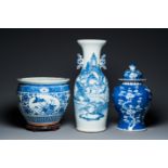 A Chinese blue and white 'landscape' vase, a covered vase and a jardiniere, 19th C.