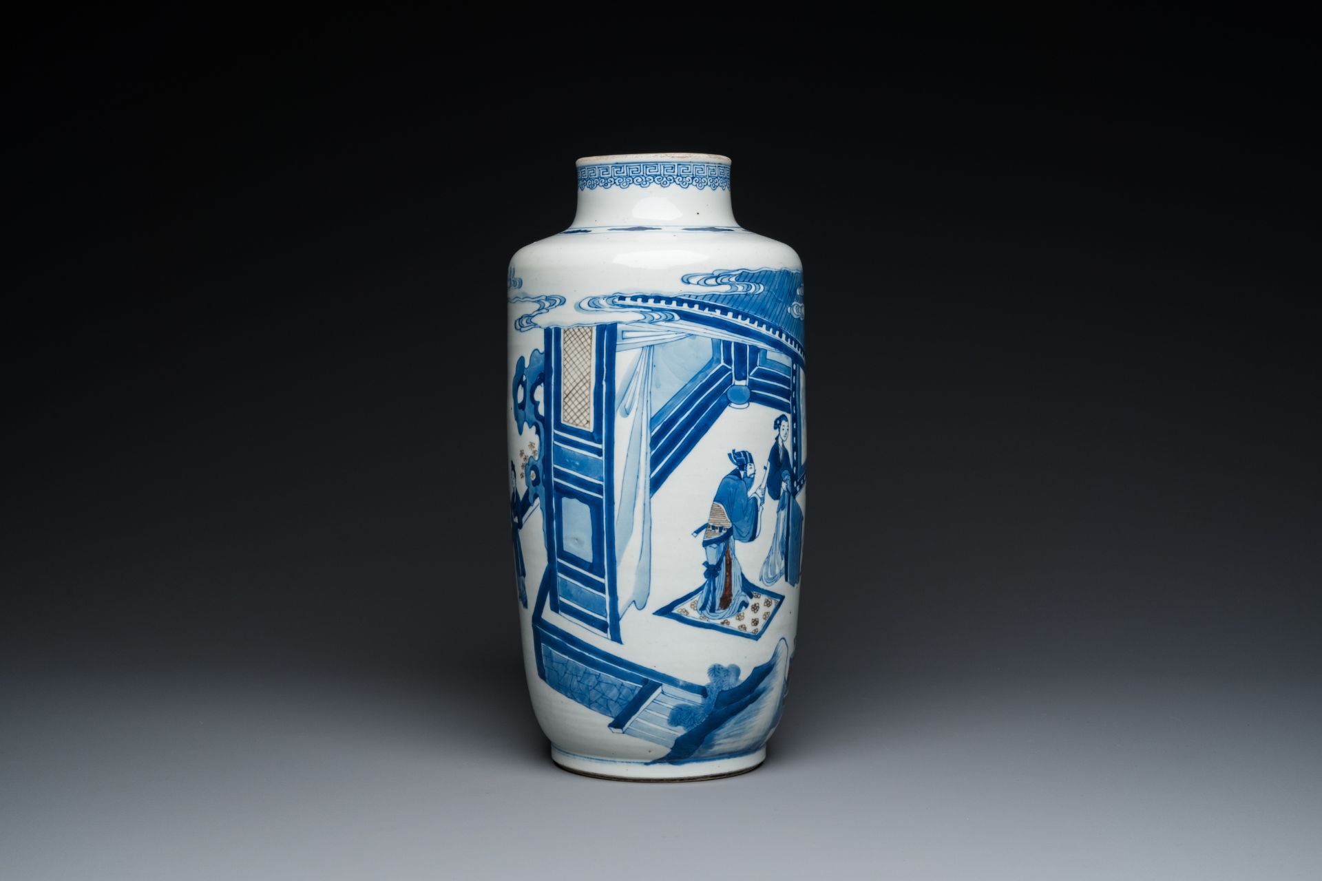 A Chinese blue, white and copper-red 'narrative subject' rouleau vase, Kangxi