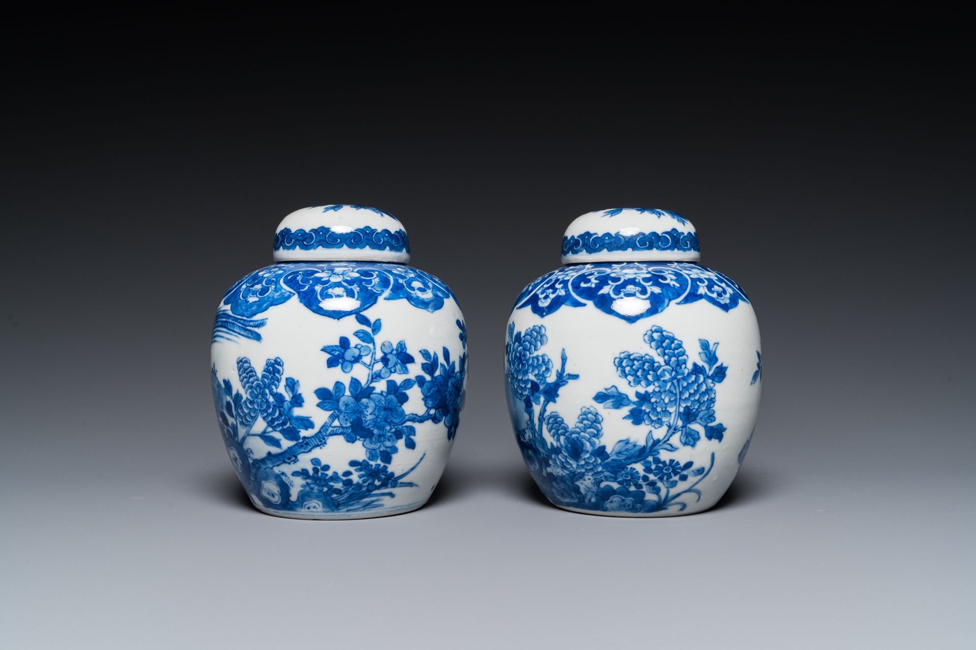 A pair of Chinese Canton famille rose vases and a pair of blue and white covered jars, 19th C. - Image 11 of 13