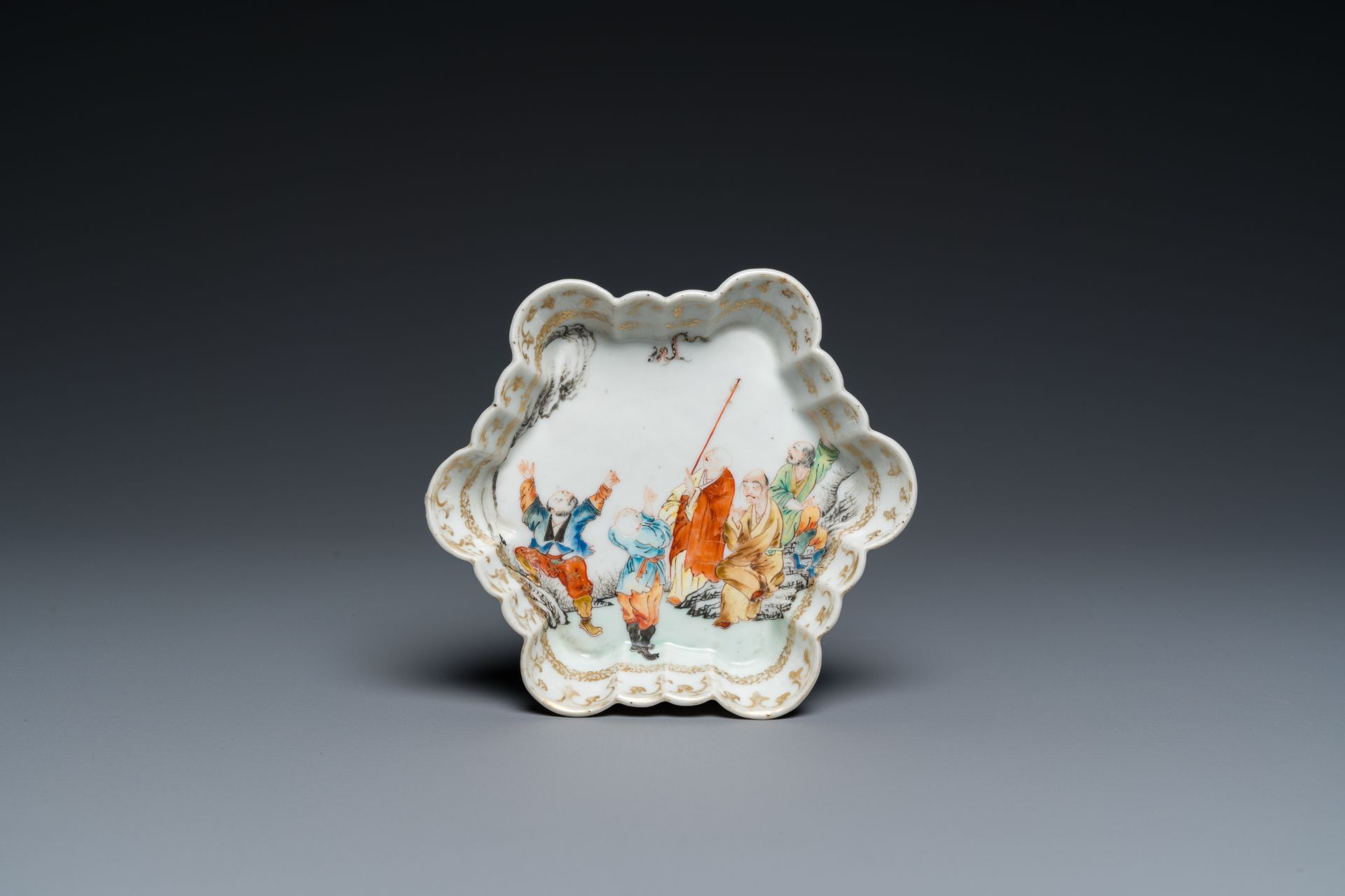 A Chinese famille rose 'five Luohan' teapot stand, Qianlong