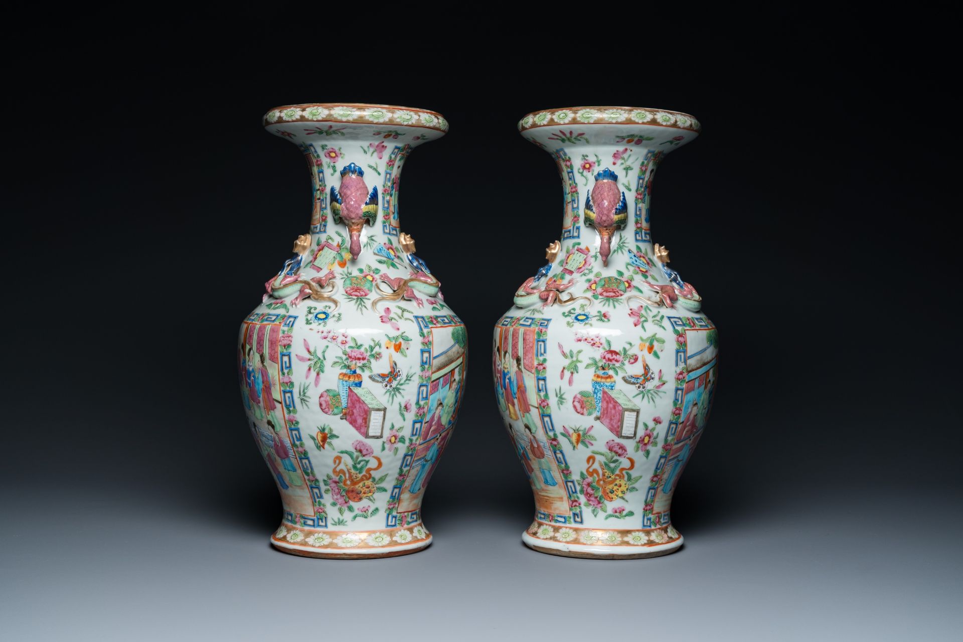 A pair of Chinese Canton famille rose vases with duck-shaped handles, 19th C. - Image 5 of 7