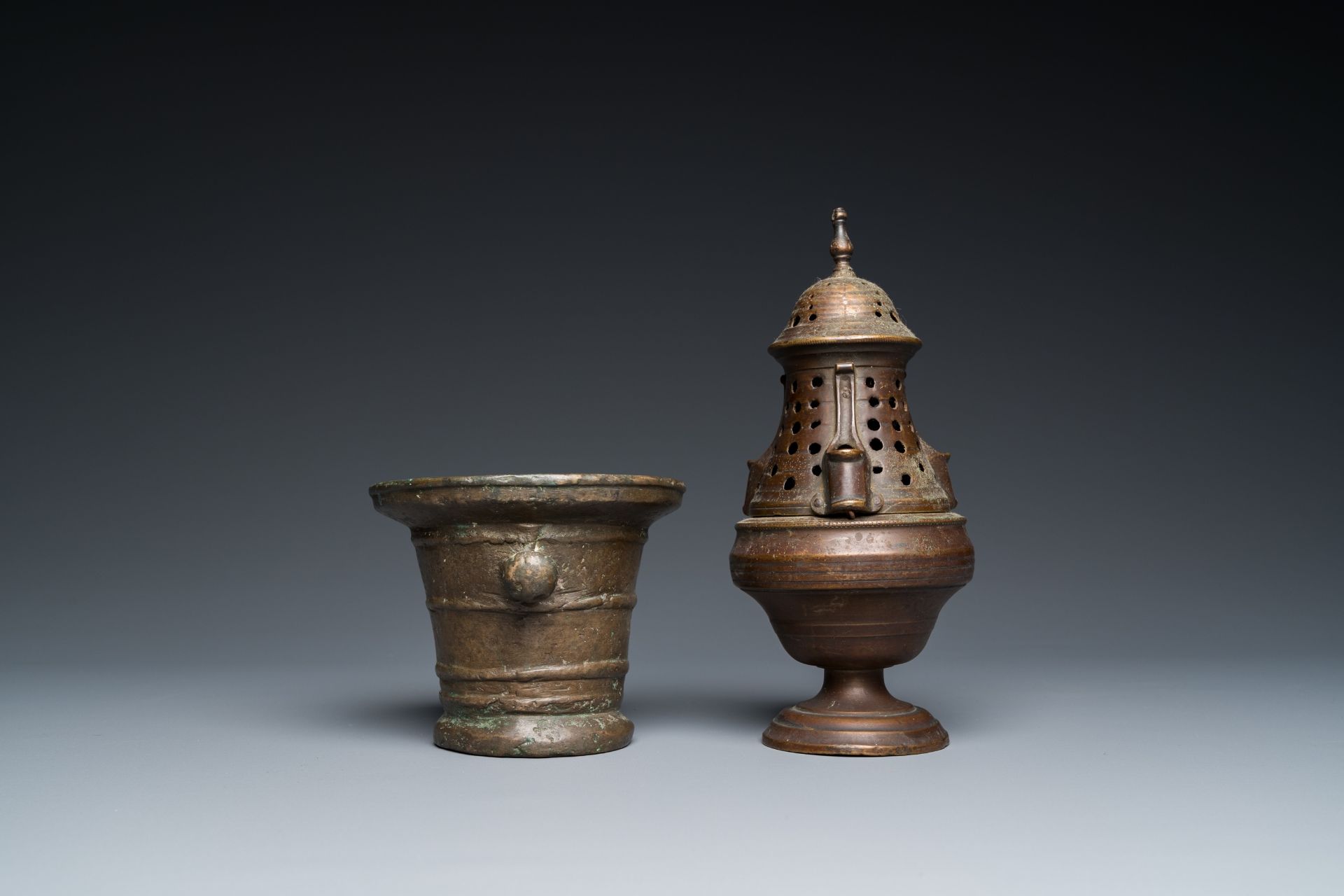 A bronze mortar, a censer and two pax of which one gilded, Western Europe, 16/17th C. - Image 3 of 9