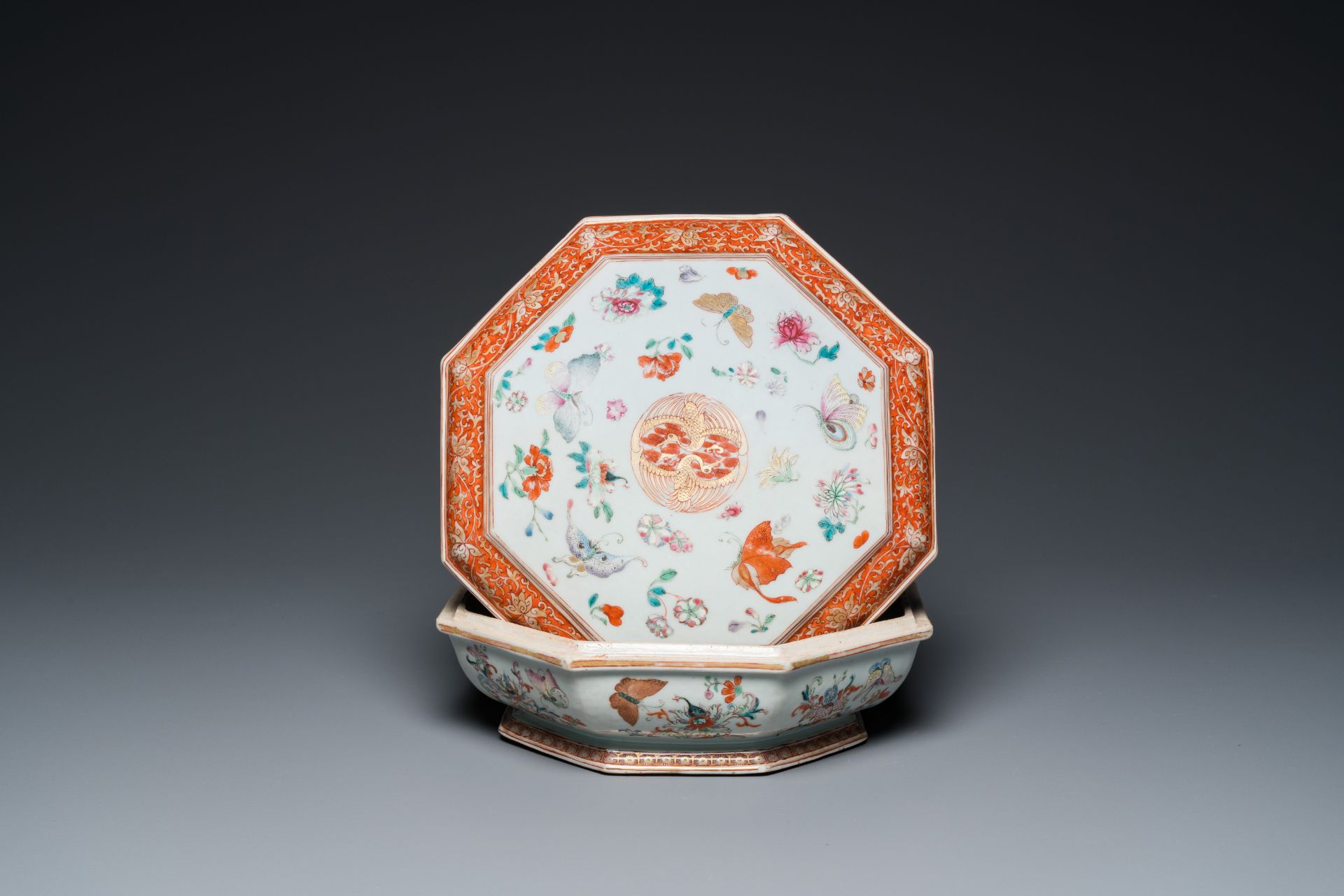 A Chinese famille rose, iron-red and gilt octagonal box and cover with butterflies, Yongzheng