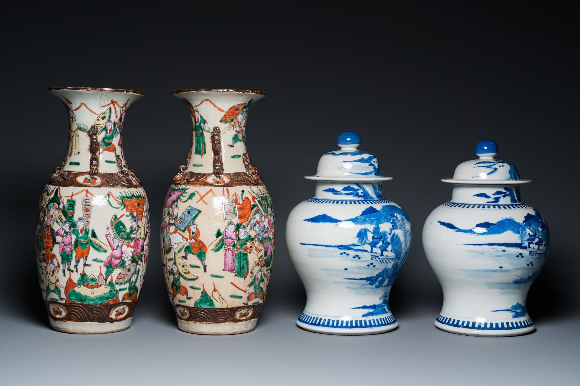 A pair of Chinese blue and white covered vases and a pair of Nanking famille rose vases, 19th C. - Image 5 of 9