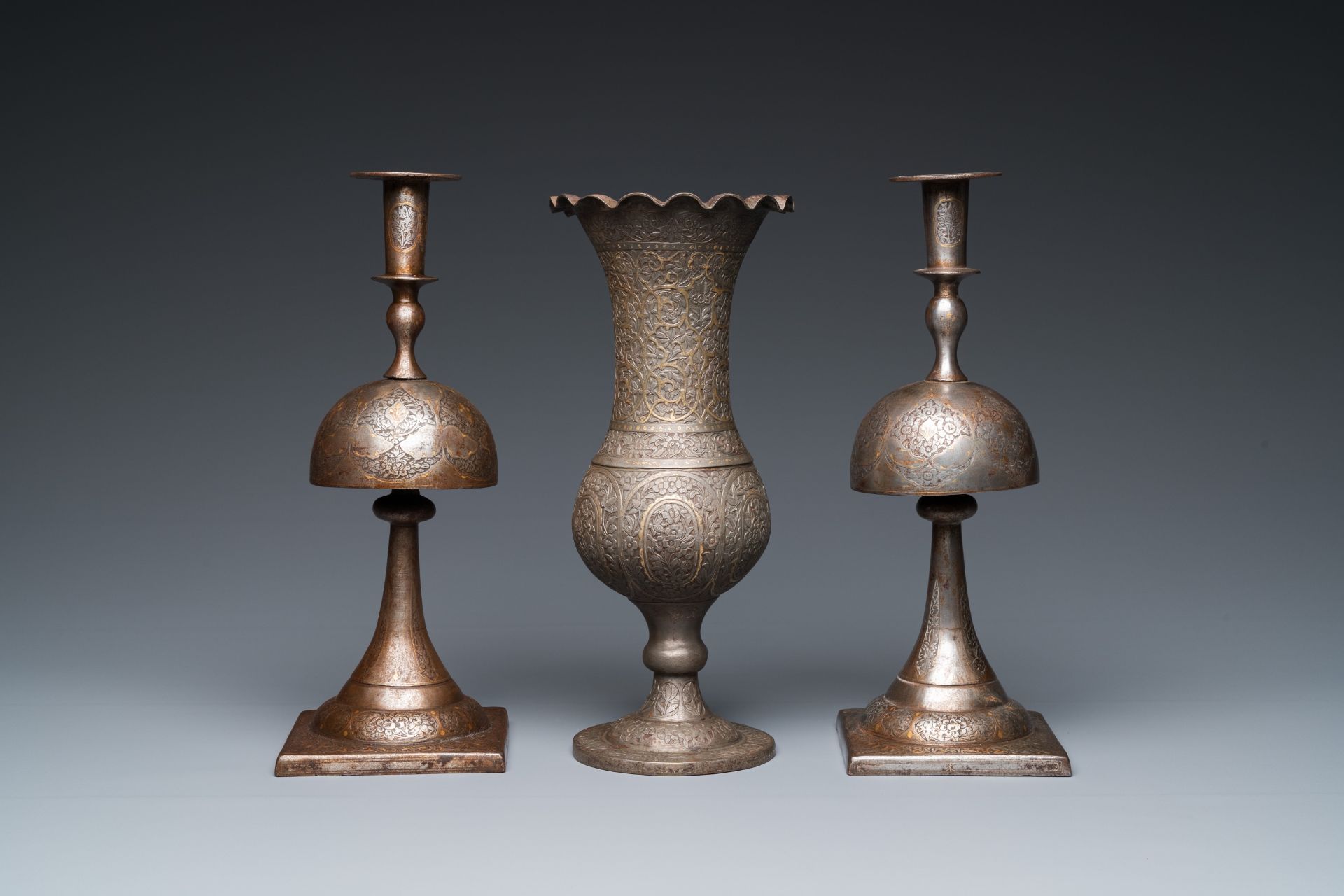 A pair of Qajar damascened candlesticks and a vase, Persia, 19th C. - Image 2 of 7