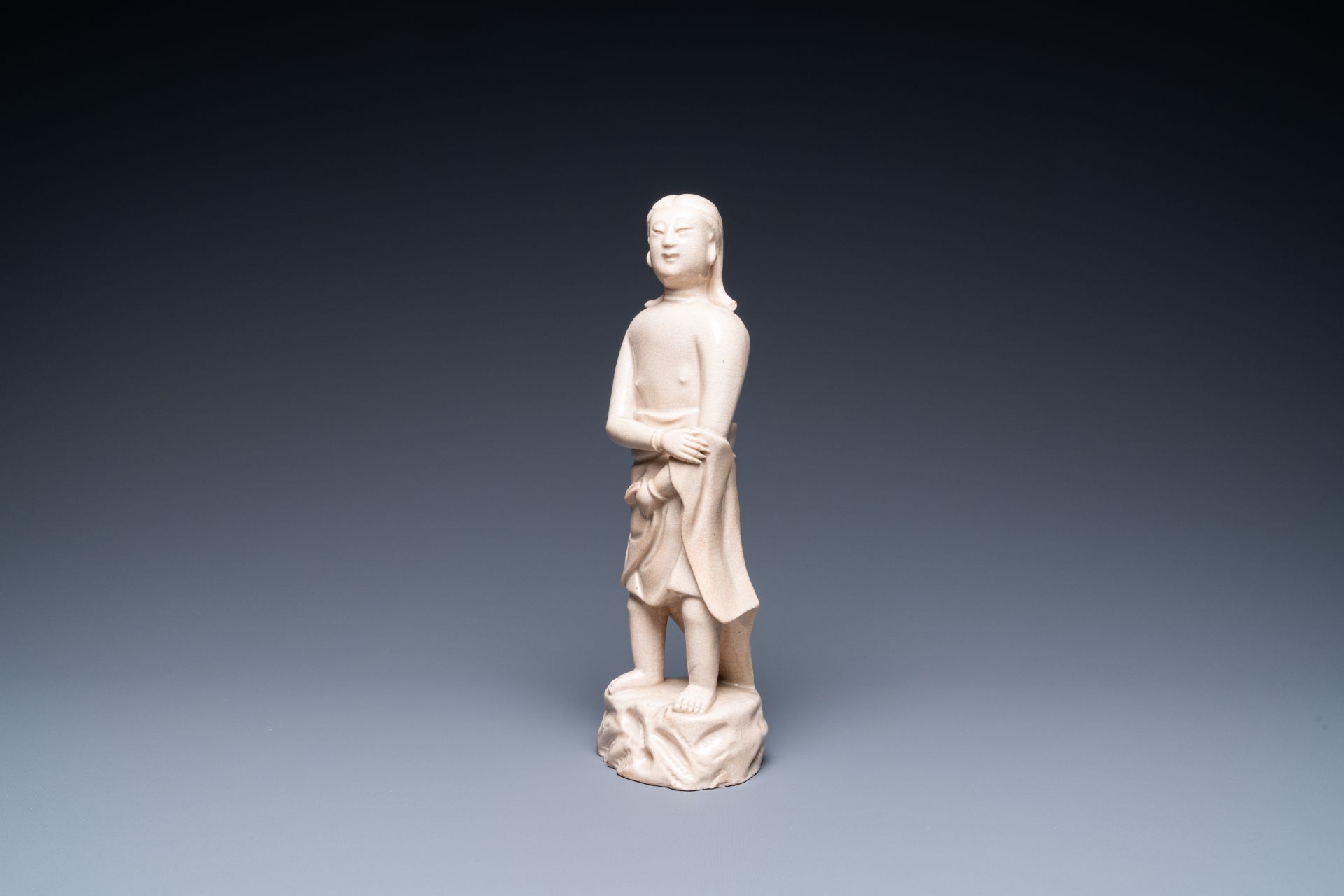 A Chinese monochrome soft paste sculpture of Adam, Kangxi