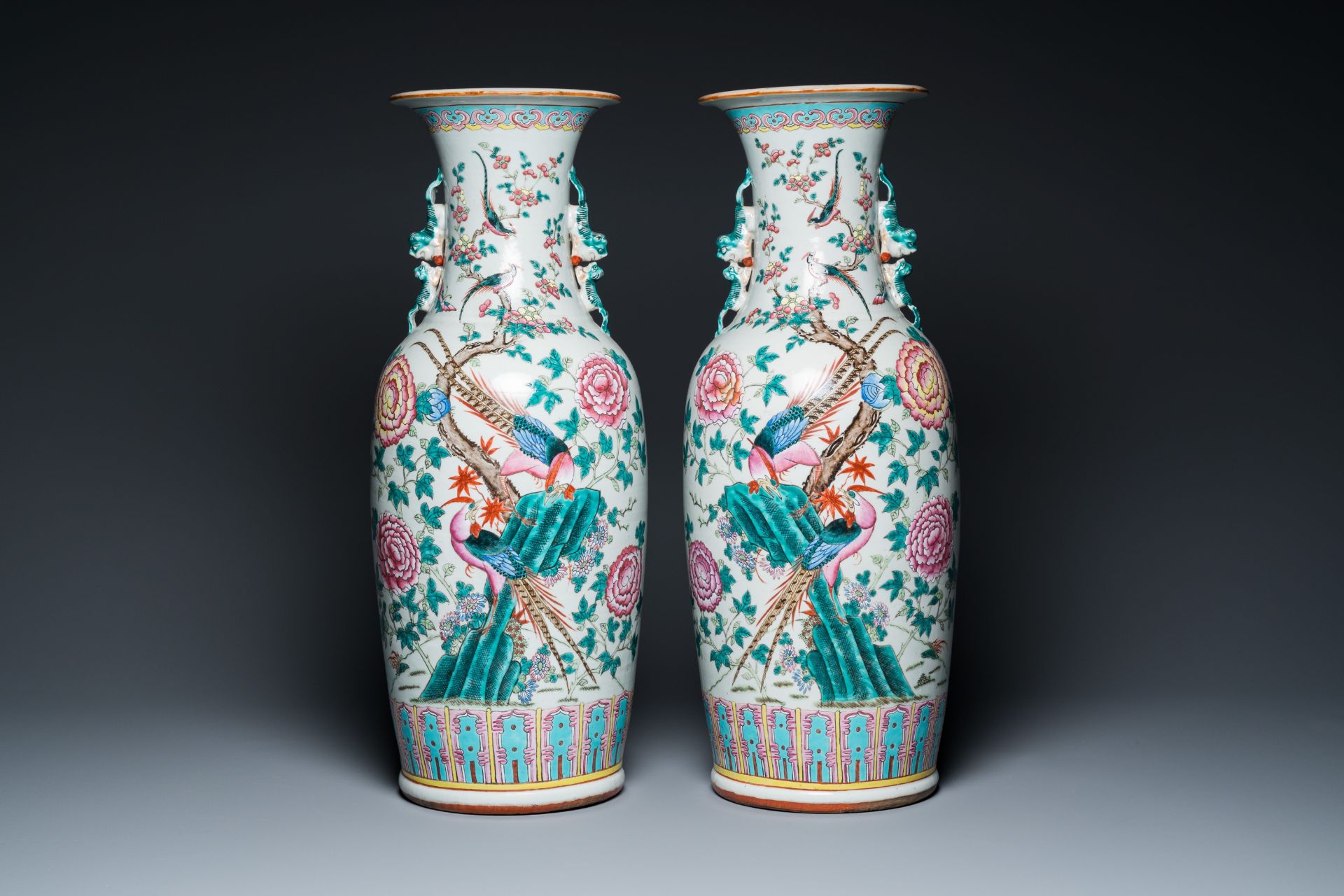 A pair of Chinese famille rose 'phoenixes and pheasants' vases, 19th C. - Image 3 of 6