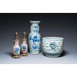 A Chinese blue and white celadon-ground vase, a pair of Nanking vases and a famille verte fish bowl,