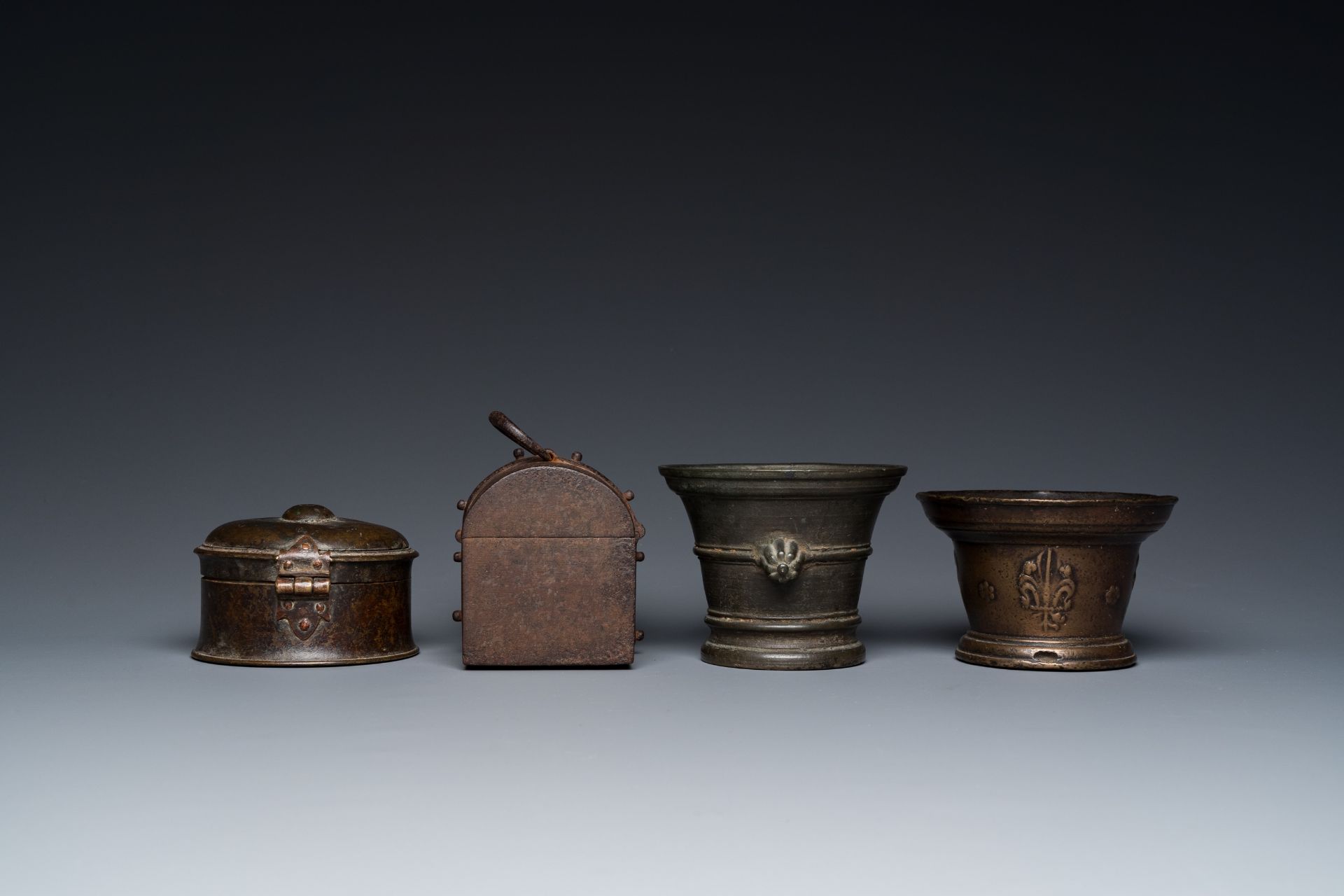 Two bronze mortars, a round lidded box and an iron casket, Western Europe, 16/17th C. - Image 5 of 9