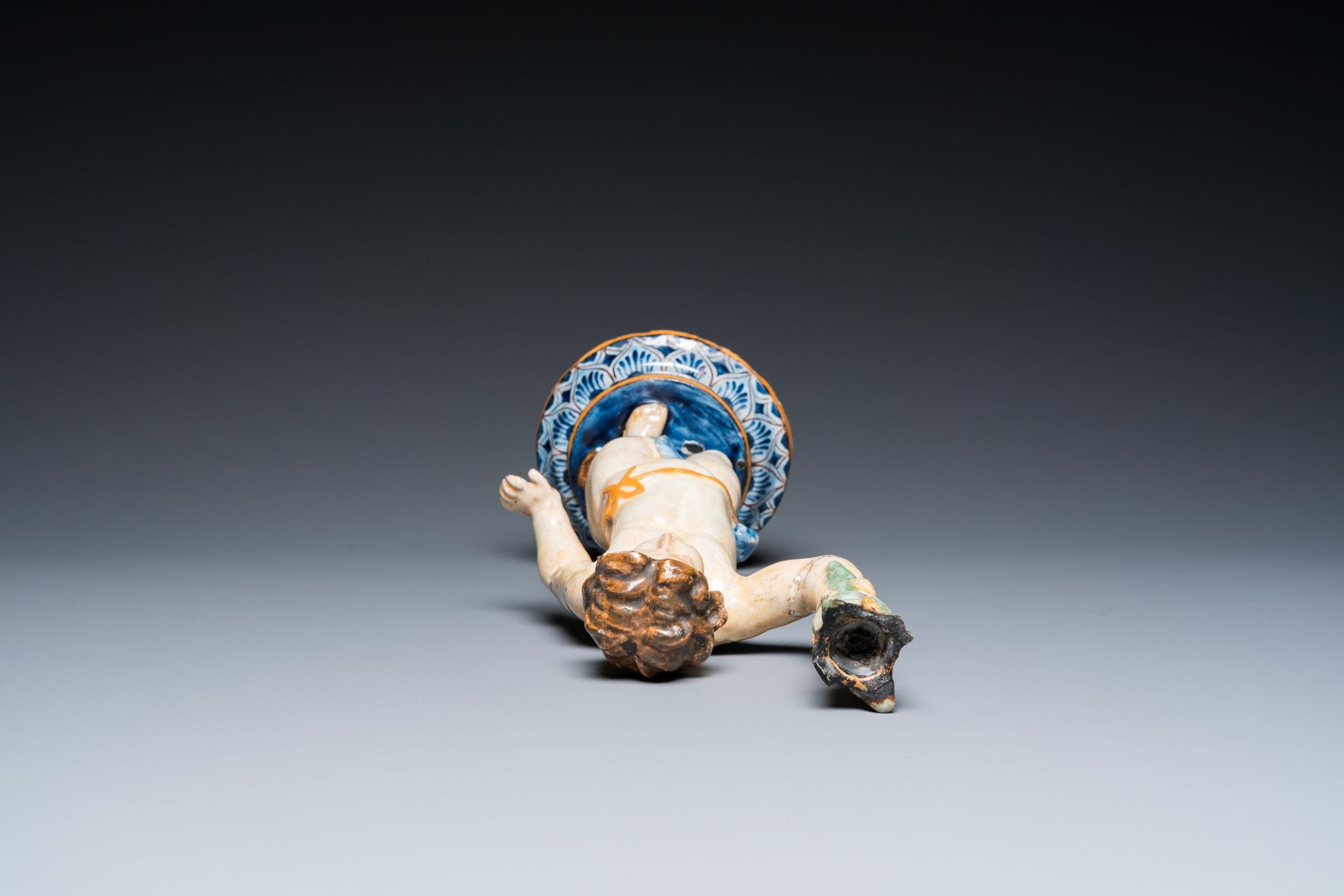 A polychrome pottery sculpture of a standing young man, Spain or France, 18/19th C. - Image 6 of 7
