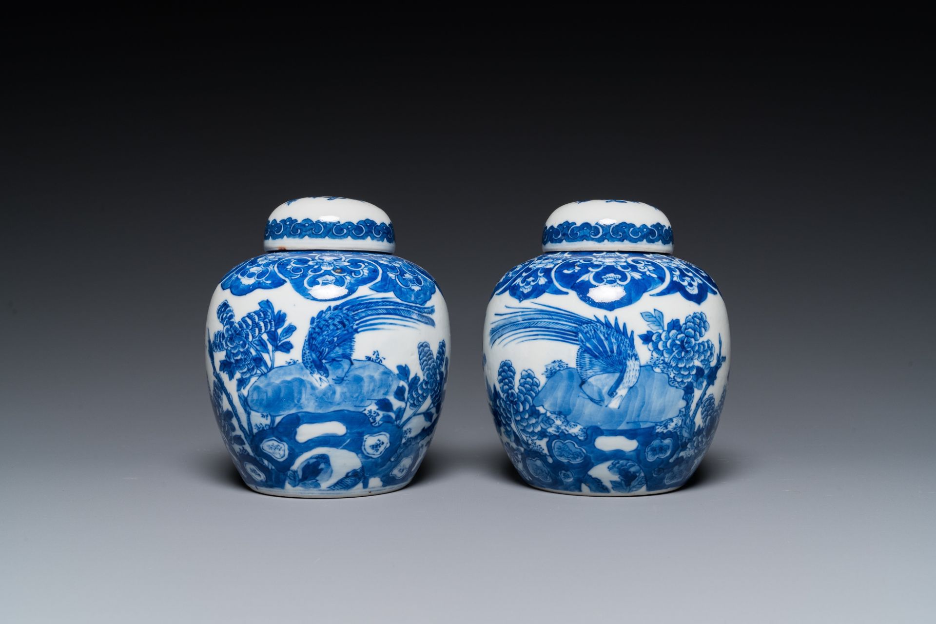 A pair of Chinese Canton famille rose vases and a pair of blue and white covered jars, 19th C. - Image 8 of 13