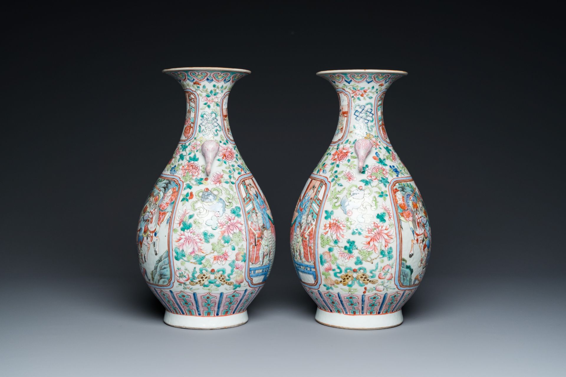 A pair of Chinese famille rose vases with elephant handles, 19th C. - Image 4 of 6