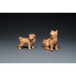 Two Chinese 'mingqi' painted pottery models of dogs, Han