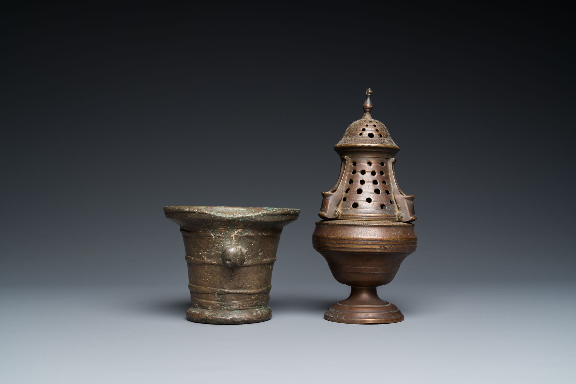 A bronze mortar, a censer and two pax of which one gilded, Western Europe, 16/17th C. - Image 5 of 9