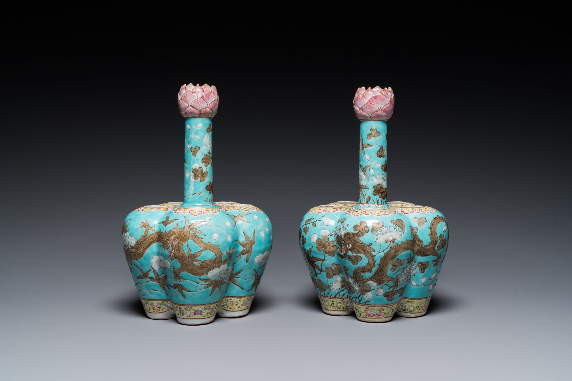 A pair of Chinese famille rose turquoise-ground flower vases with dragons, 19th C. - Image 3 of 7