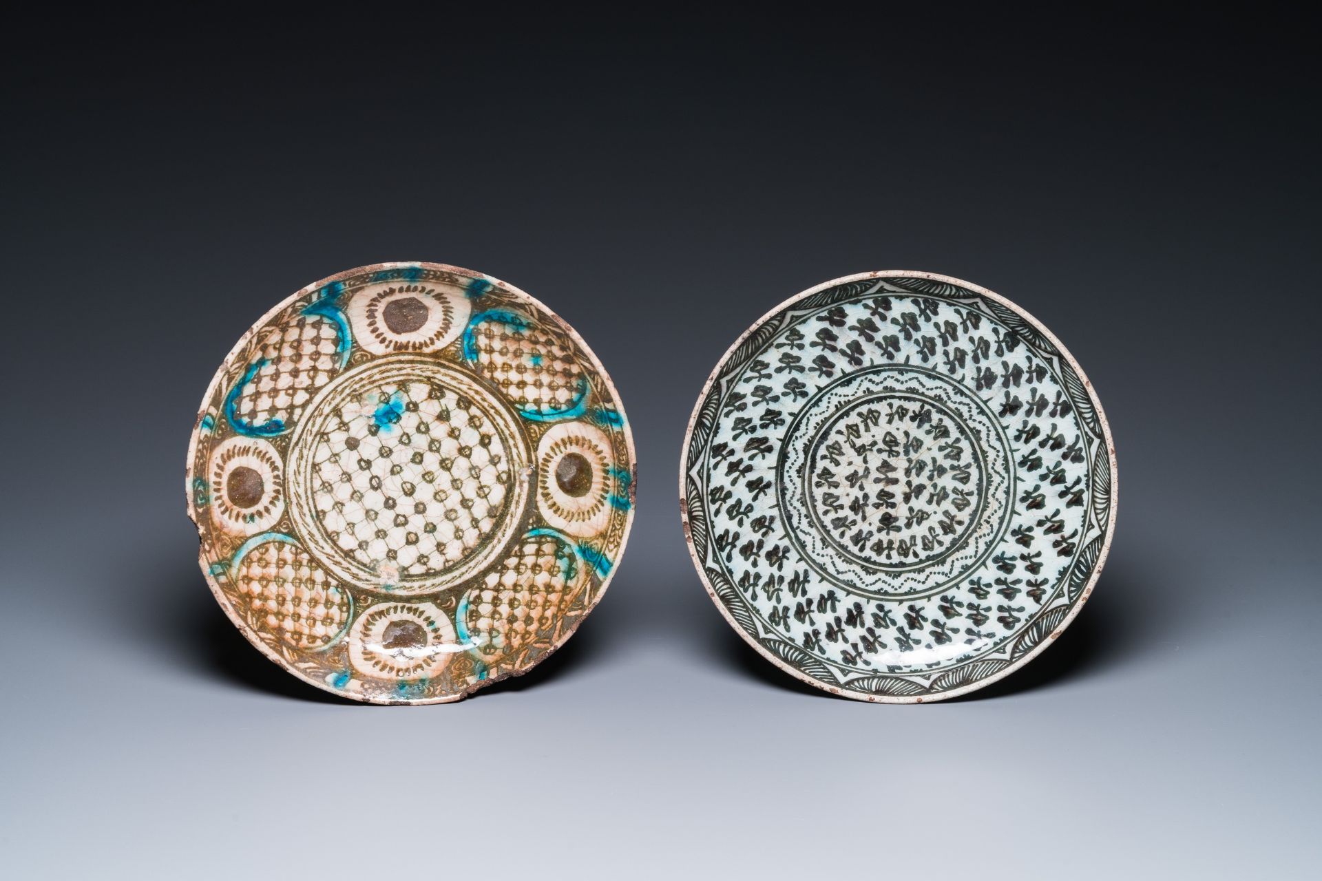 Five blue and white and polychrome Islamic pottery dishes, Qajar, Persia, 19th C. - Image 4 of 5