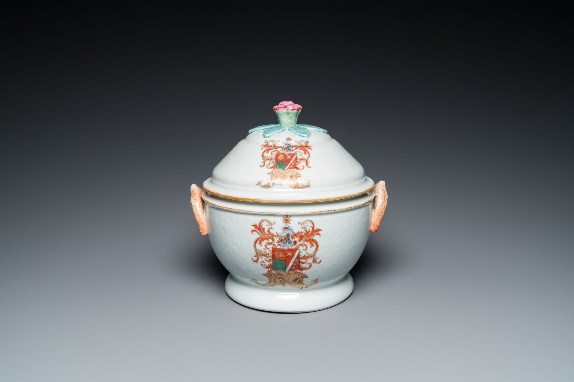 A Chinese Dutch market famille rose armorial tureen with pierced cover with the arms of 'de Heere',