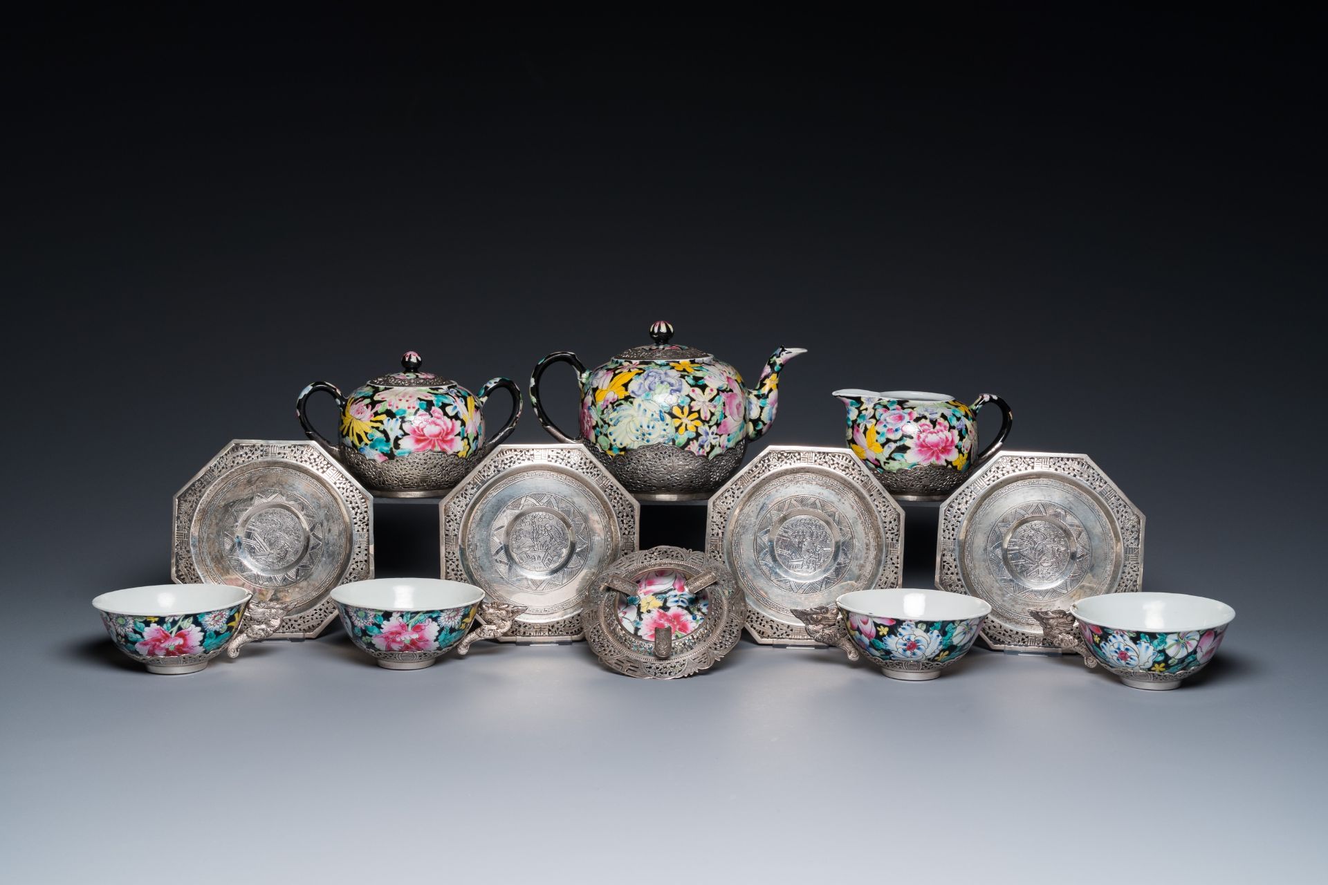 A Chinese eight-piece silver-mounted famille rose millefleurs tea service, Qianlong mark 20th C. - Image 2 of 12