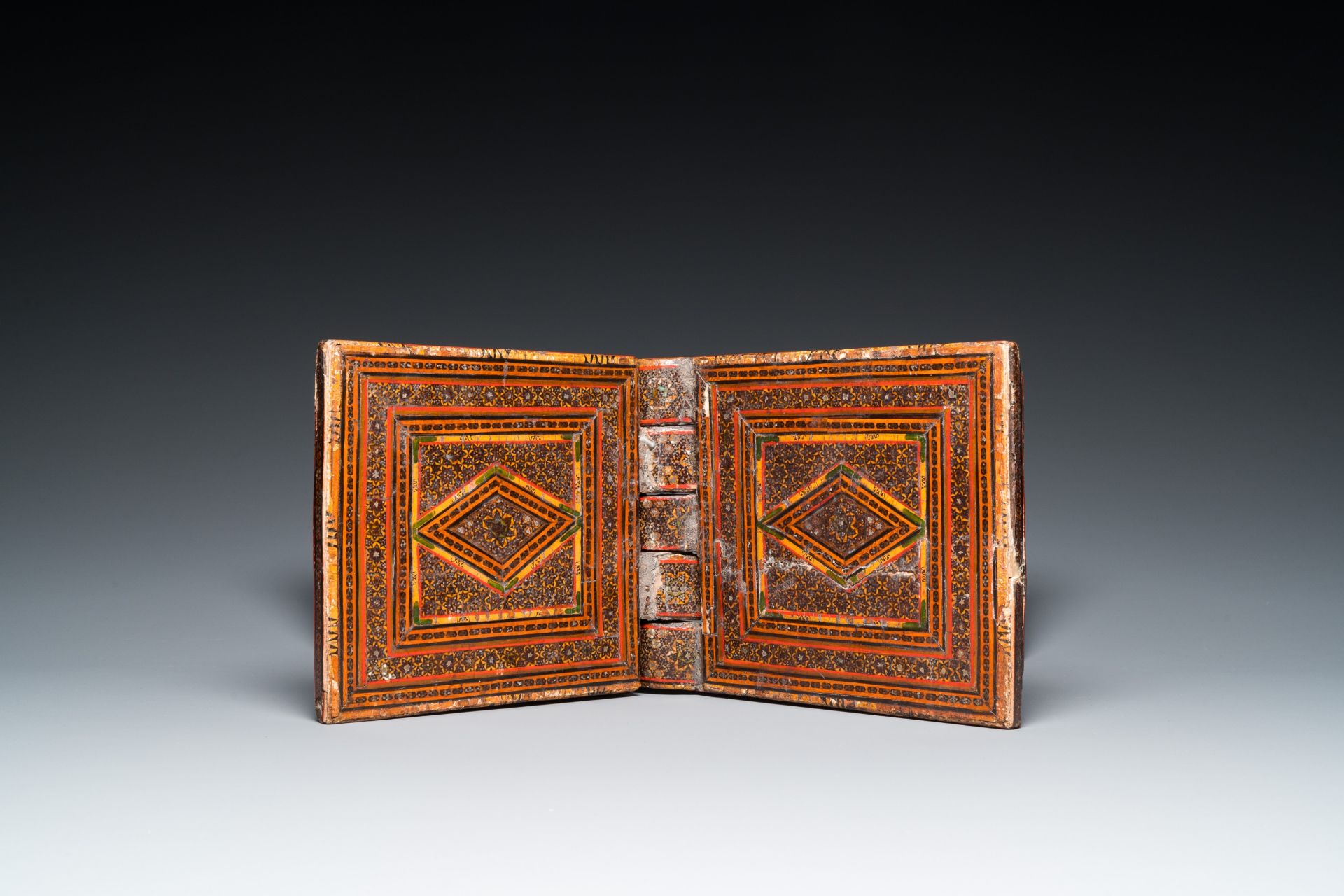 A painted and lacquered wooden Qur'an stand and a box and cover, Qajar, Persia, 19th C. - Image 8 of 16