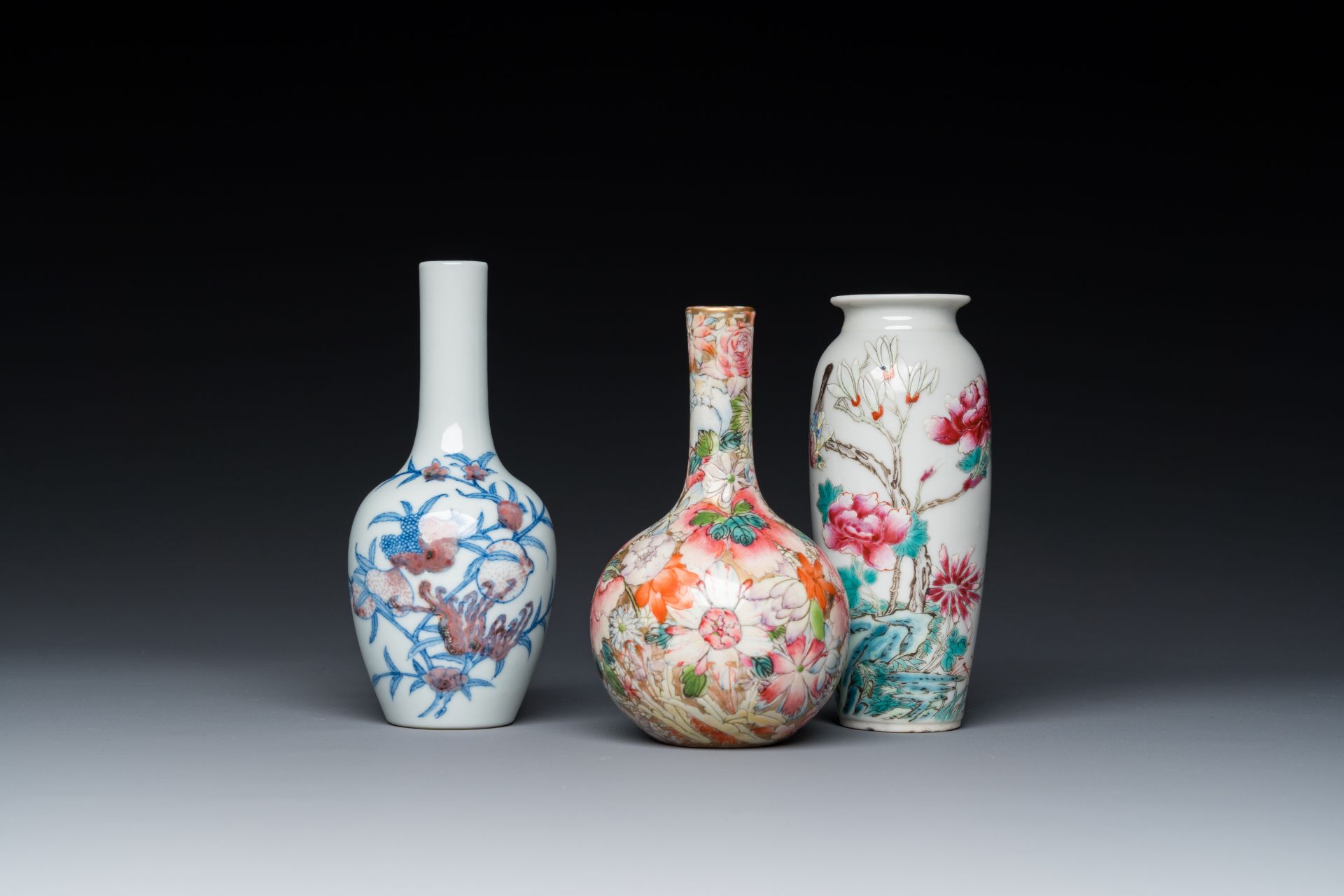 Three Chinese famille rose and blue, white and copper-red vases, 19/20th C.