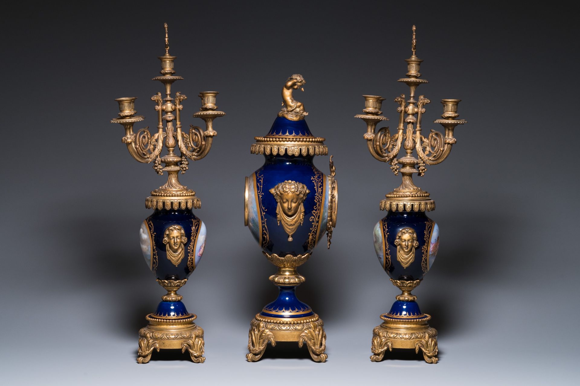 A large three-piece Sevres-style clock garniture with gilt bronze mounts, France, 19th C. - Image 2 of 11