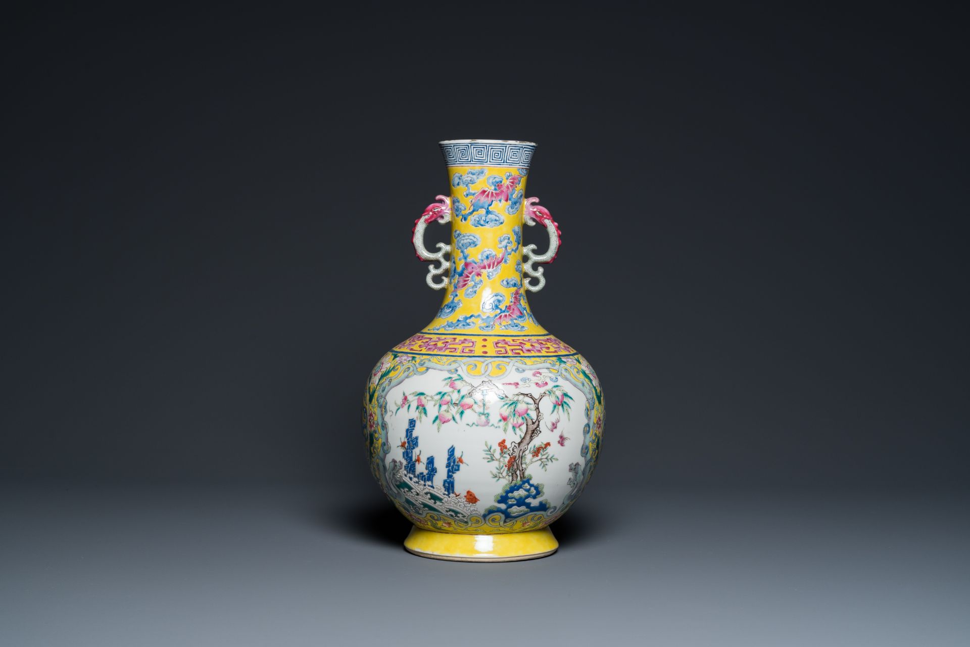 A Chinese yellow-ground famille rose 'nine peaches' bottle vase, Jiaqing