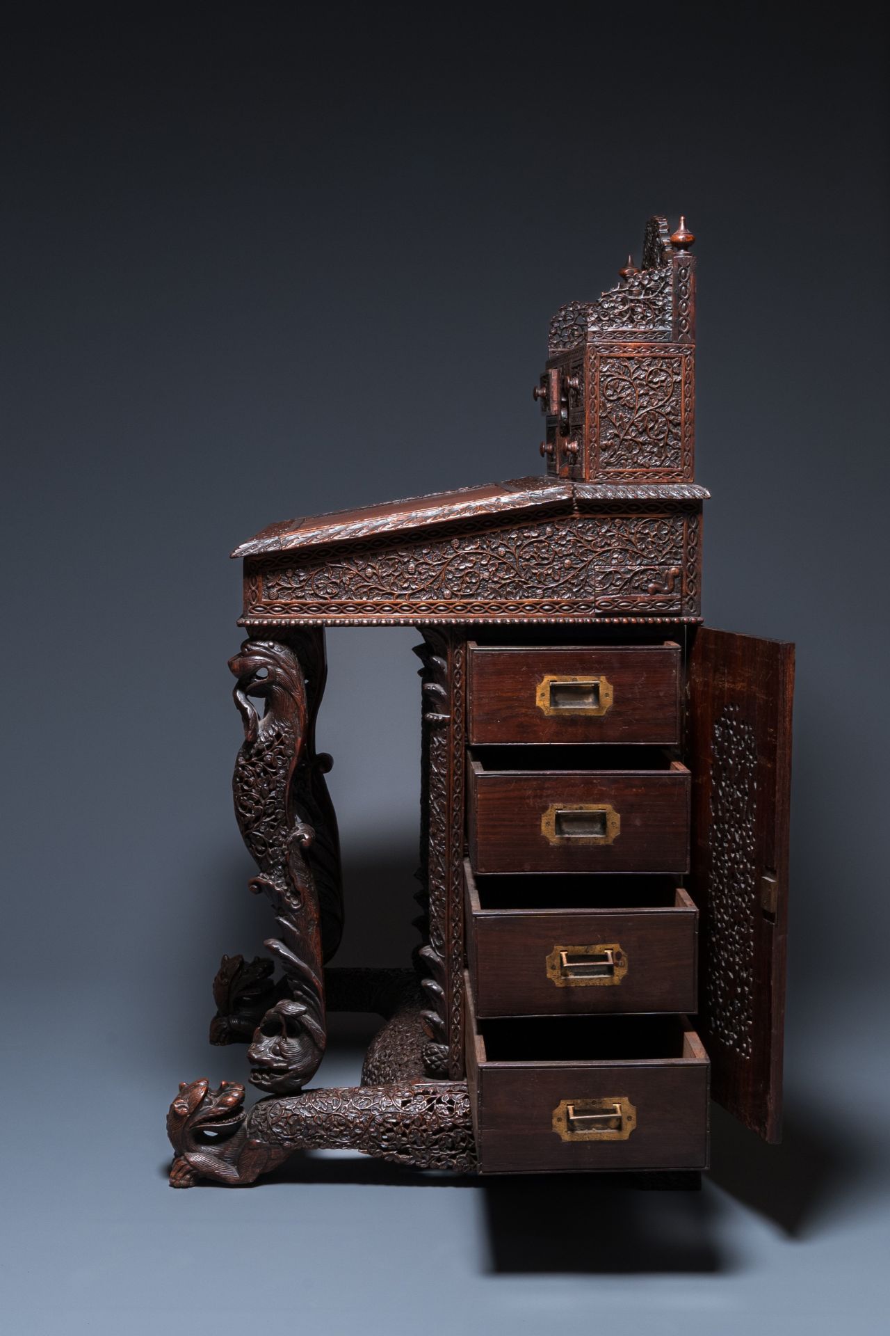 A colonial Anglo-Indian reticulated wooden desk with hidden compartment, 19th C. - Image 5 of 24