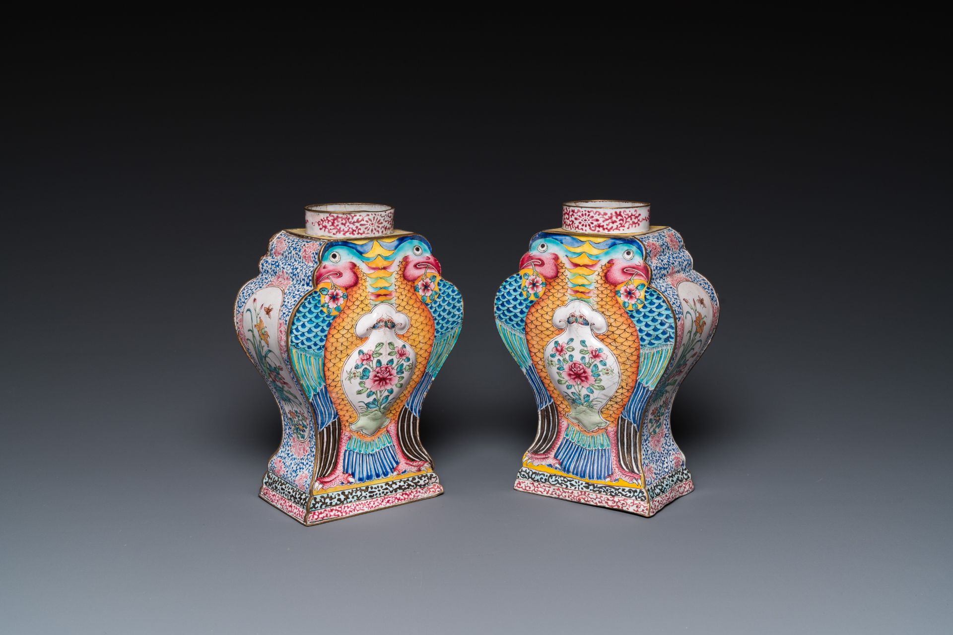 A pair of rare Chinese Canton enamel 'double eagle' vases, Yongzheng