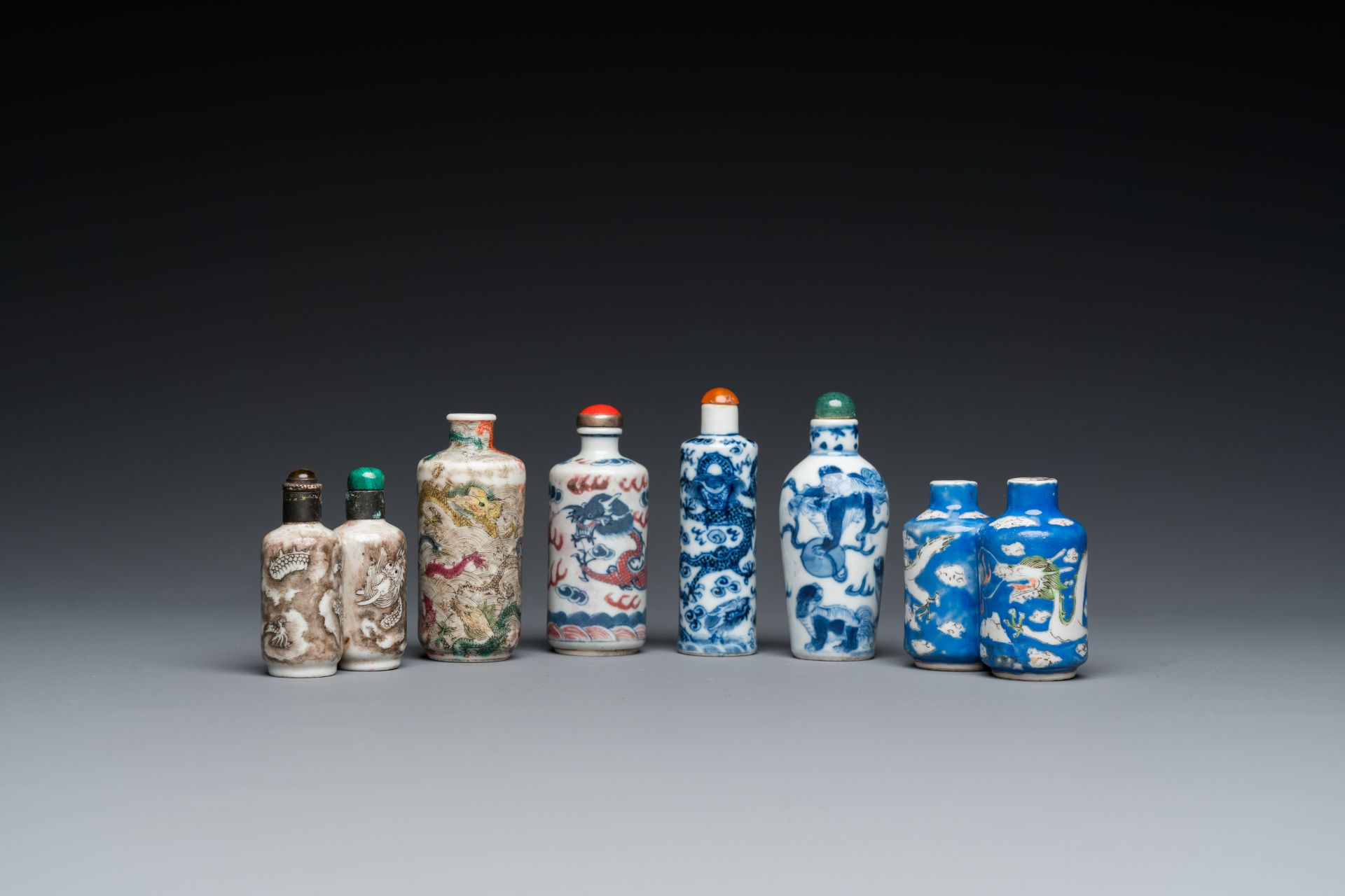 Six Chinese snuff bottles with dragons and Buddhist lions, 19/20th C.