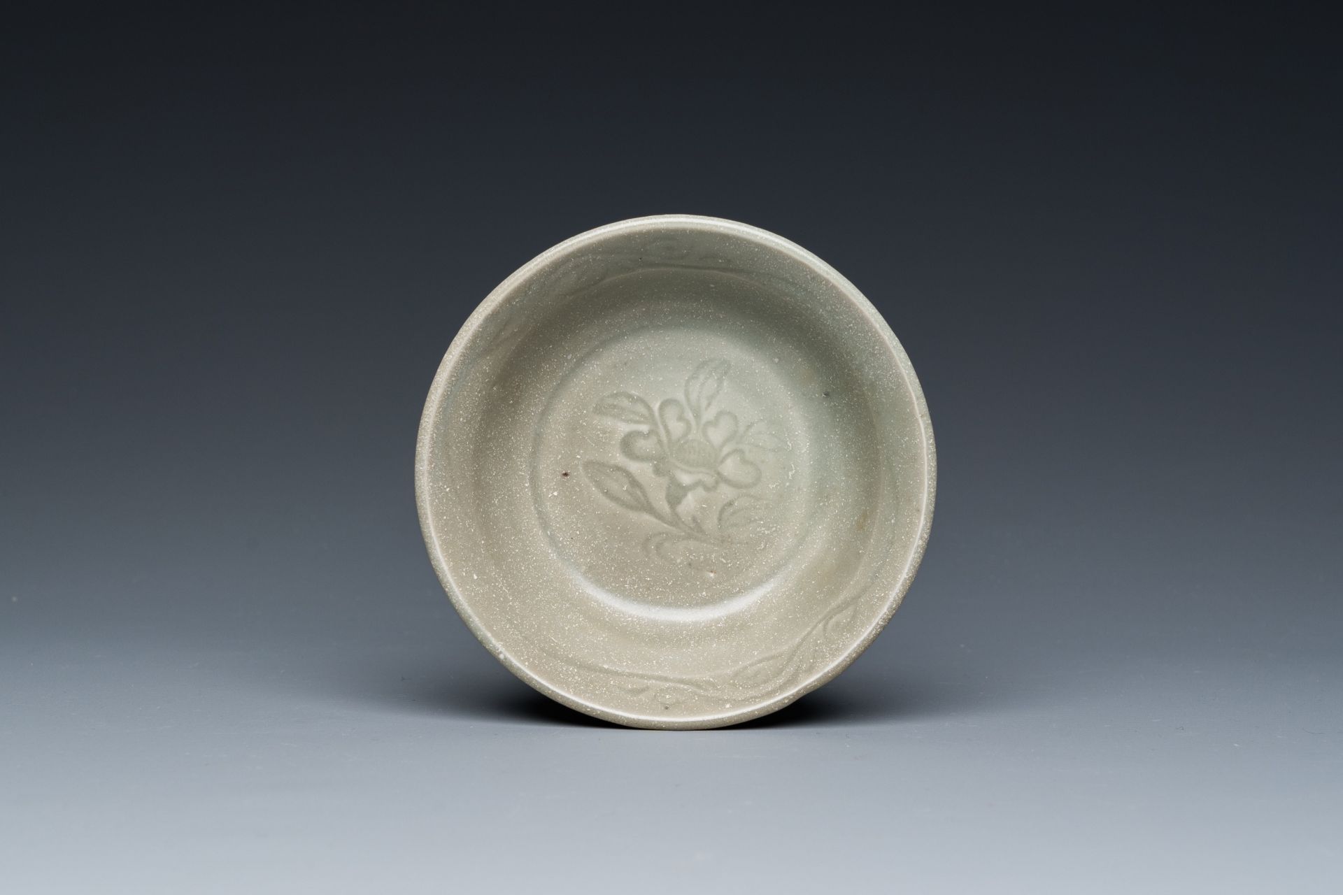 A Chinese celadon-glazed bottle vase and two bowls, Yuan/Ming - Image 2 of 9